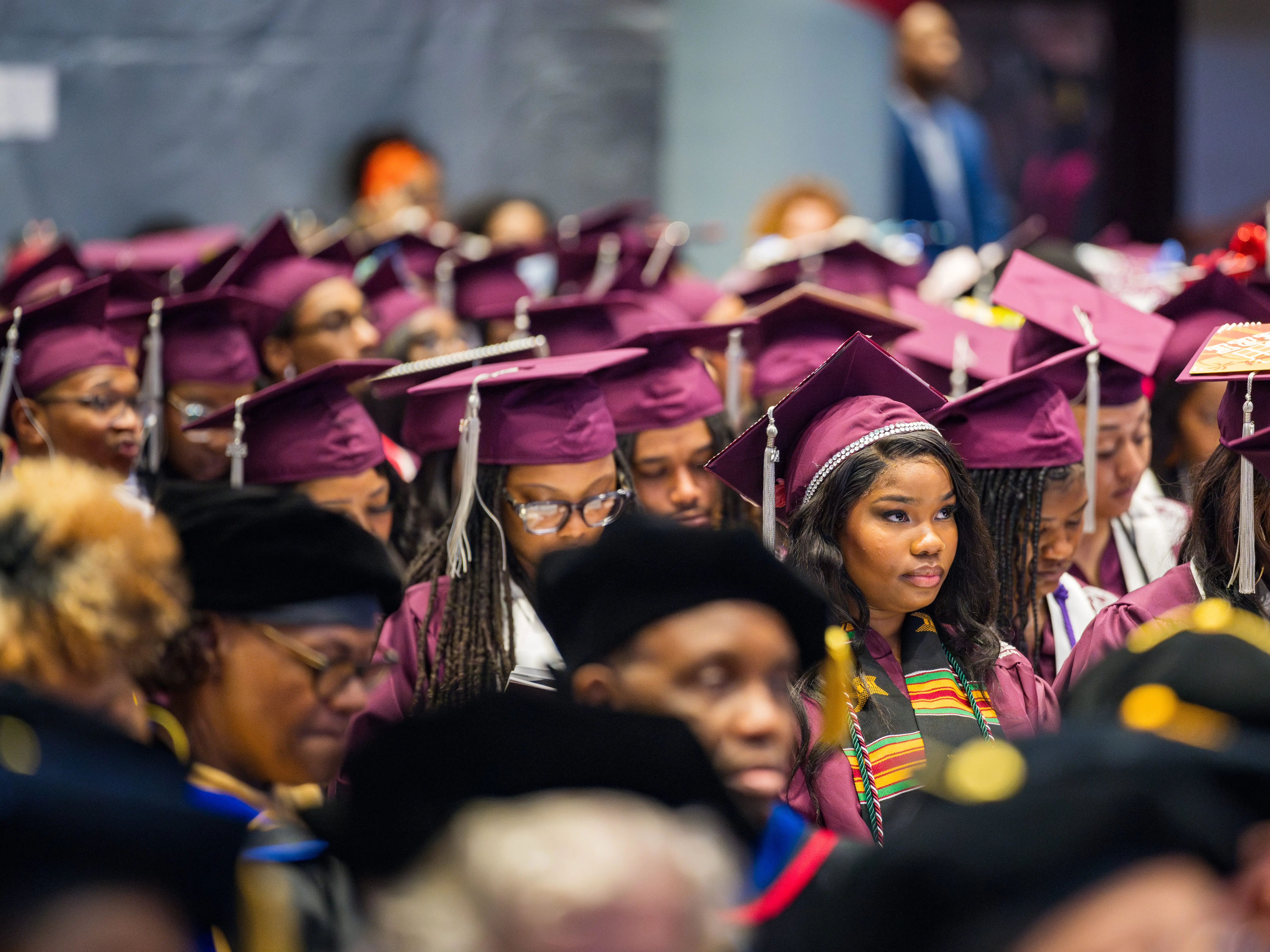 a group of graduates in graduation gowns