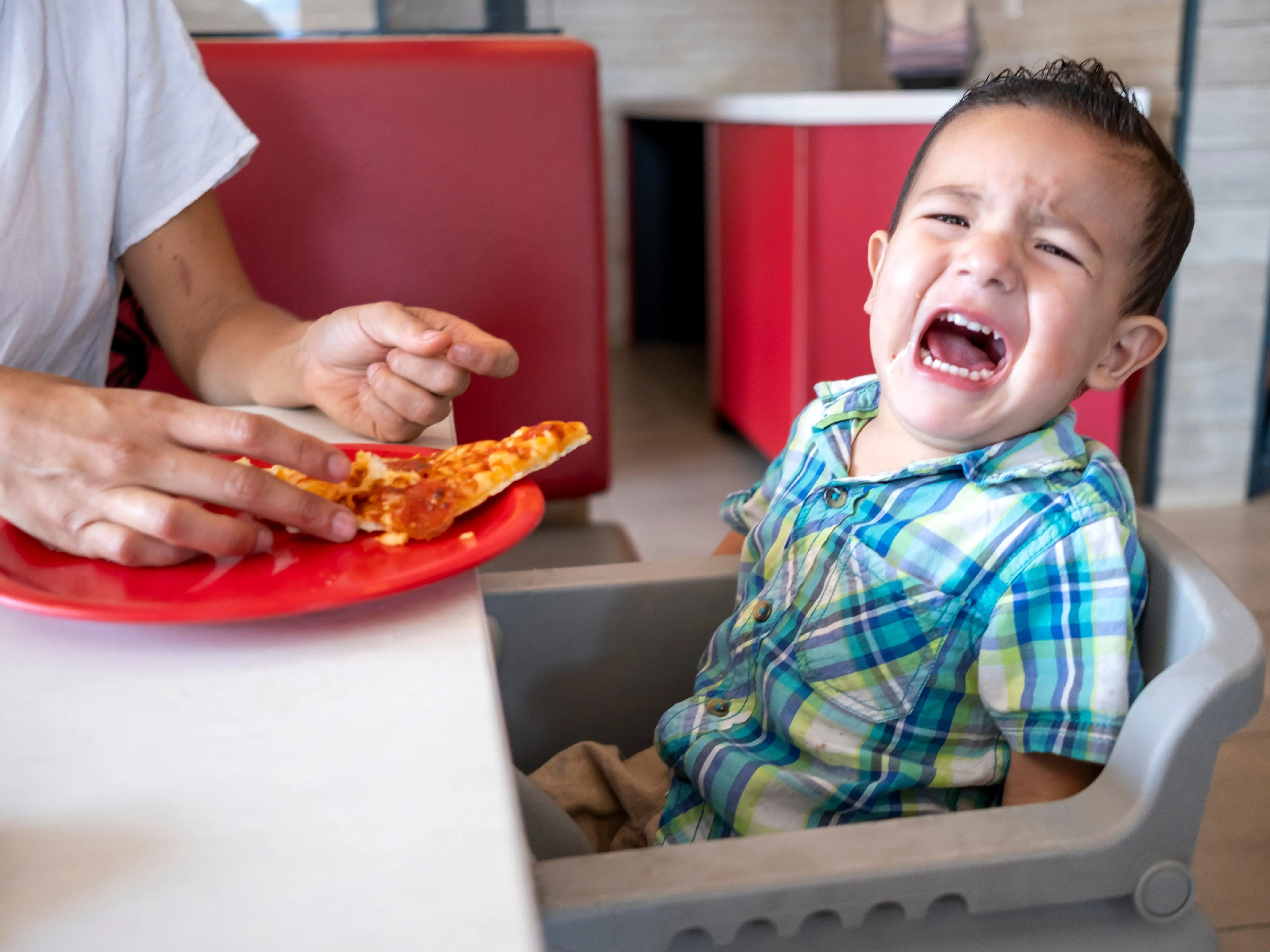 A child crying in a restaurant
