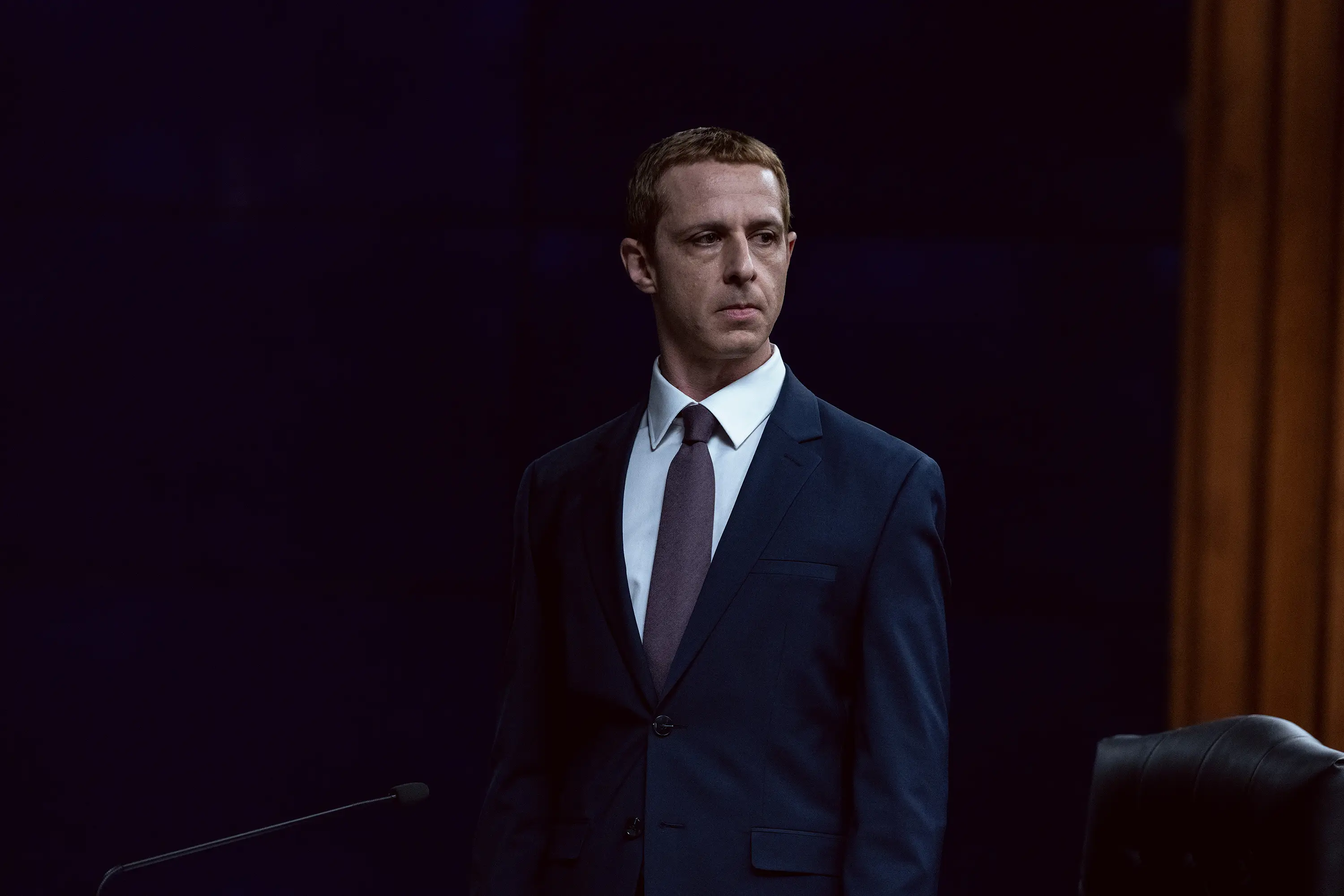 Jeremy Strong in a suit and tie as Mark Zuckerberg in The Social Reckoning movie