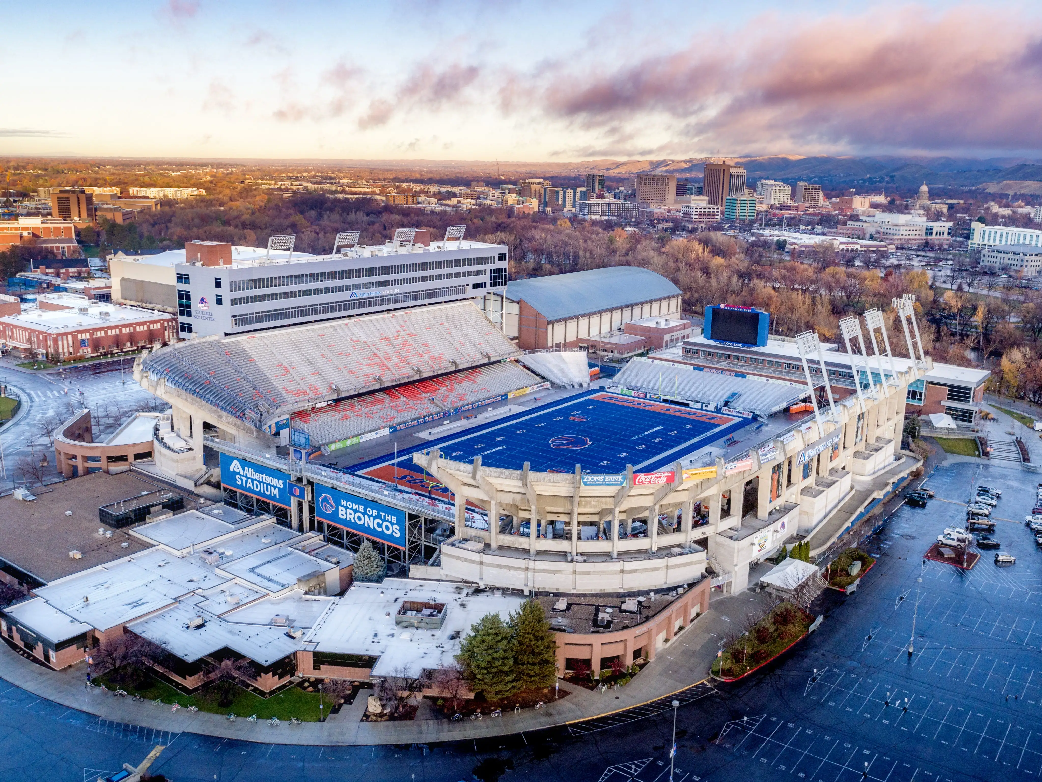 Boise, Idaho, USA November 24, 2017: Unique blue football turf and Boise Idaho skyline