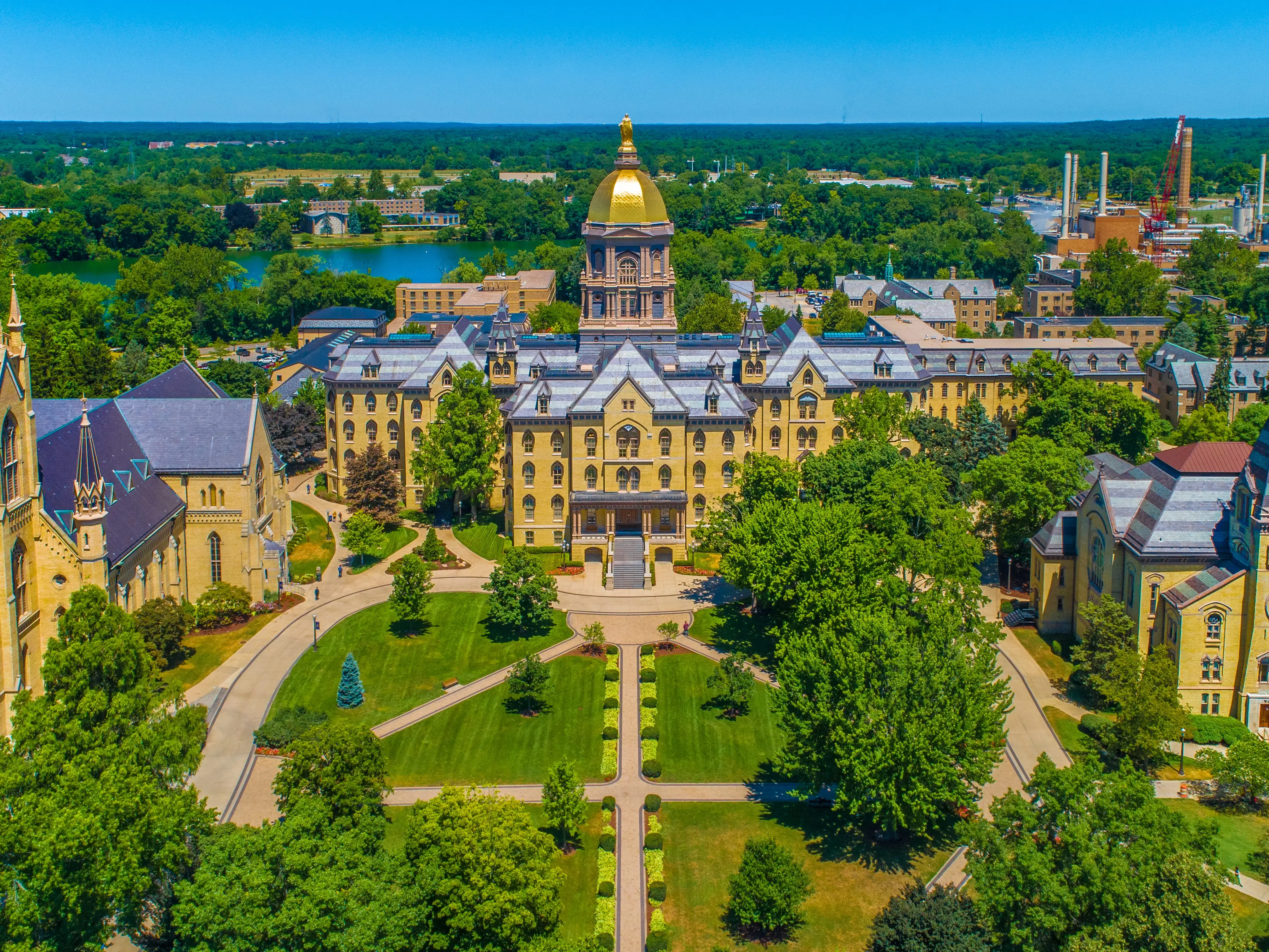 The University of Notre Dame Campus with Golden Dome, Basilica of the Sacred Heart, and Washington Hall.