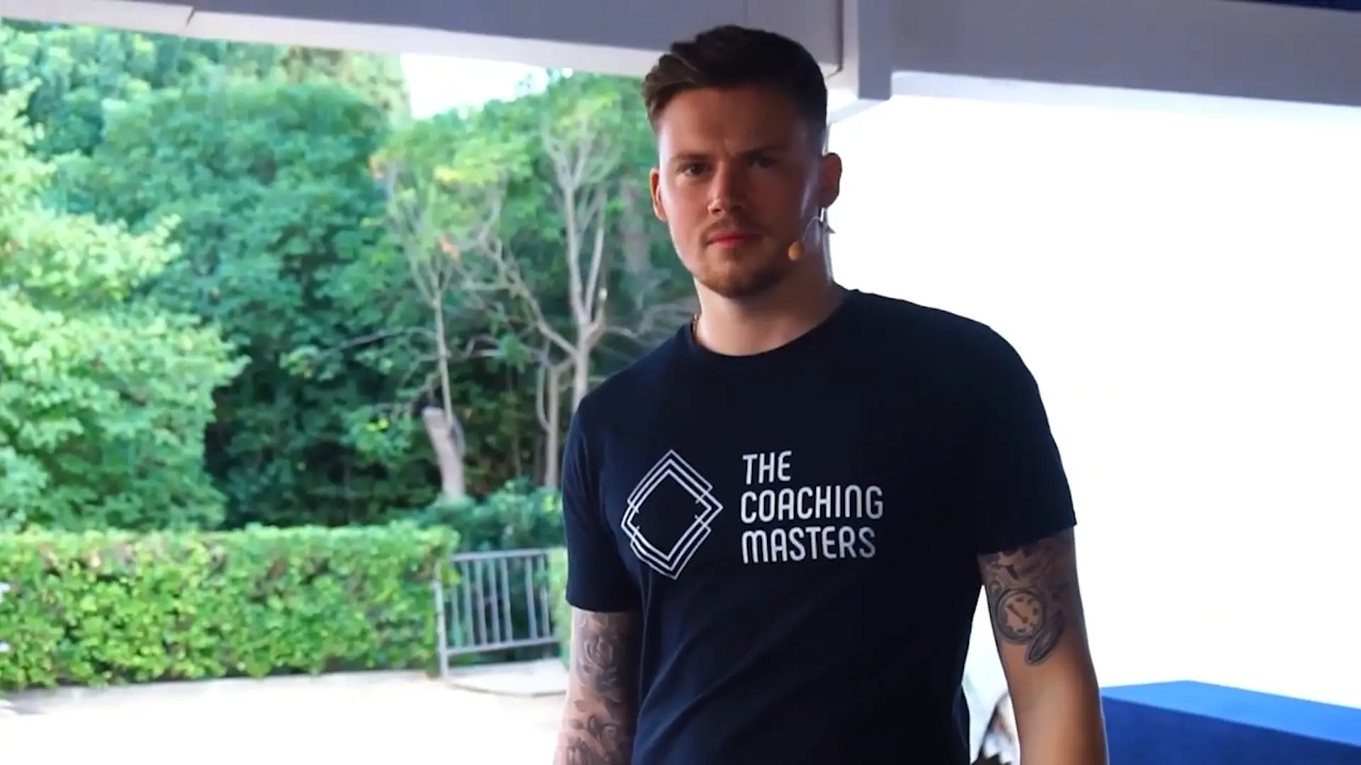 Lewis Raymond Taylor wearing black t-shirt that reads 