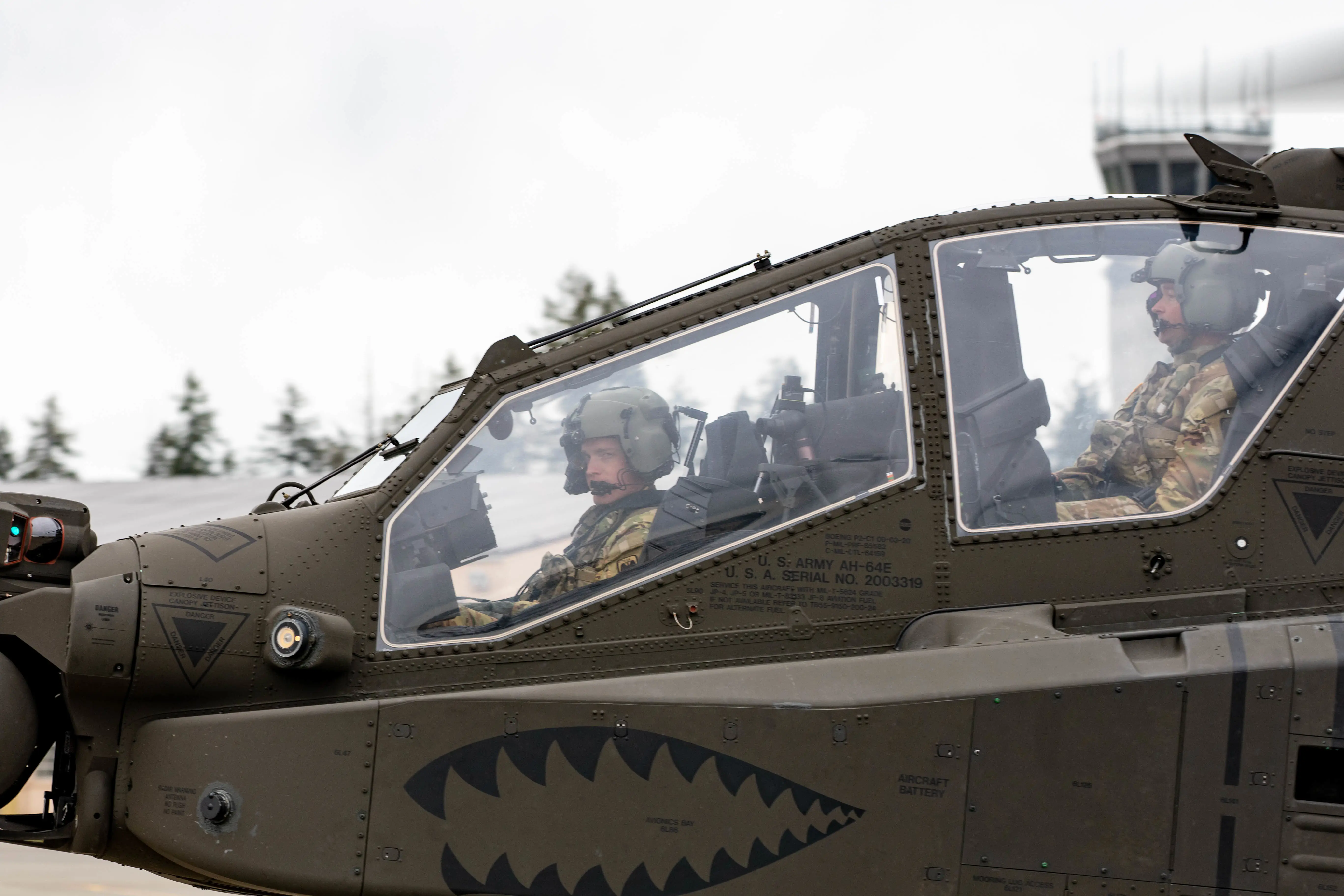 The crew of an AH-64E Apache.