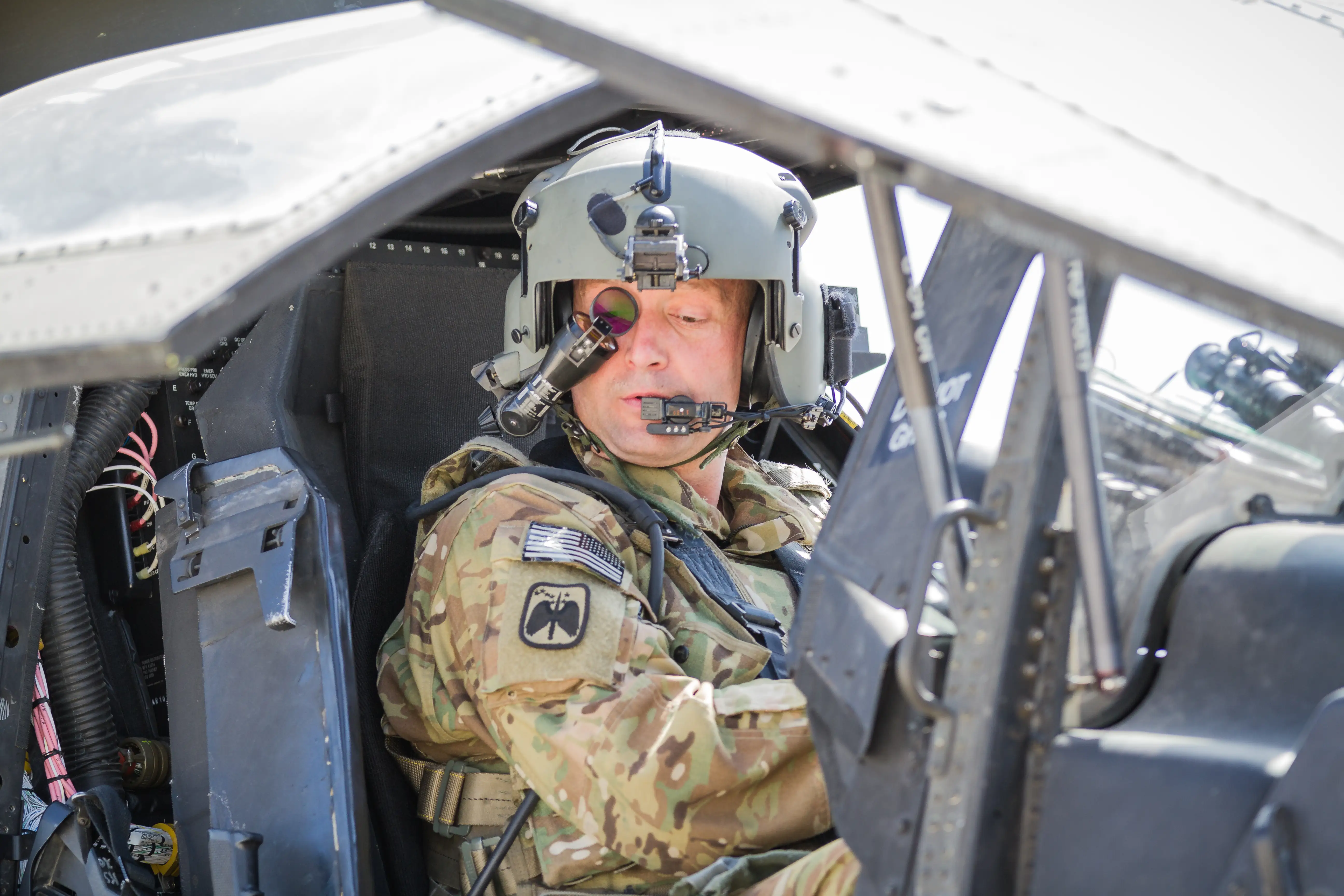 An Apache helicopter pilot wearing a helmet.