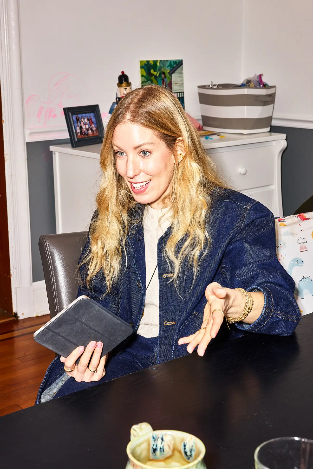 Stylist, Liz Teich, organizing Julie Kling's closet