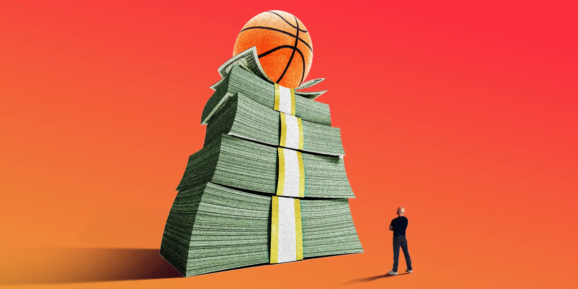 A man looking up at a basketball on top of a stack of money