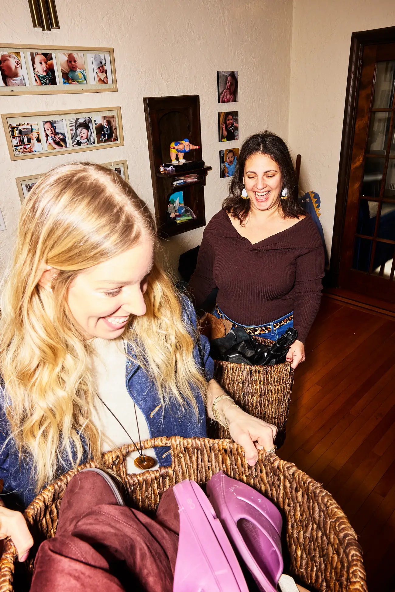 Stylist, Liz Teich, organizing Julie Kling's closet