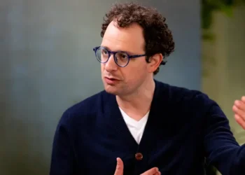 Anthropic CEO says an ‘intrinsic’ feature of AI may be fewer jobs. His answer? Redistribute the upside.