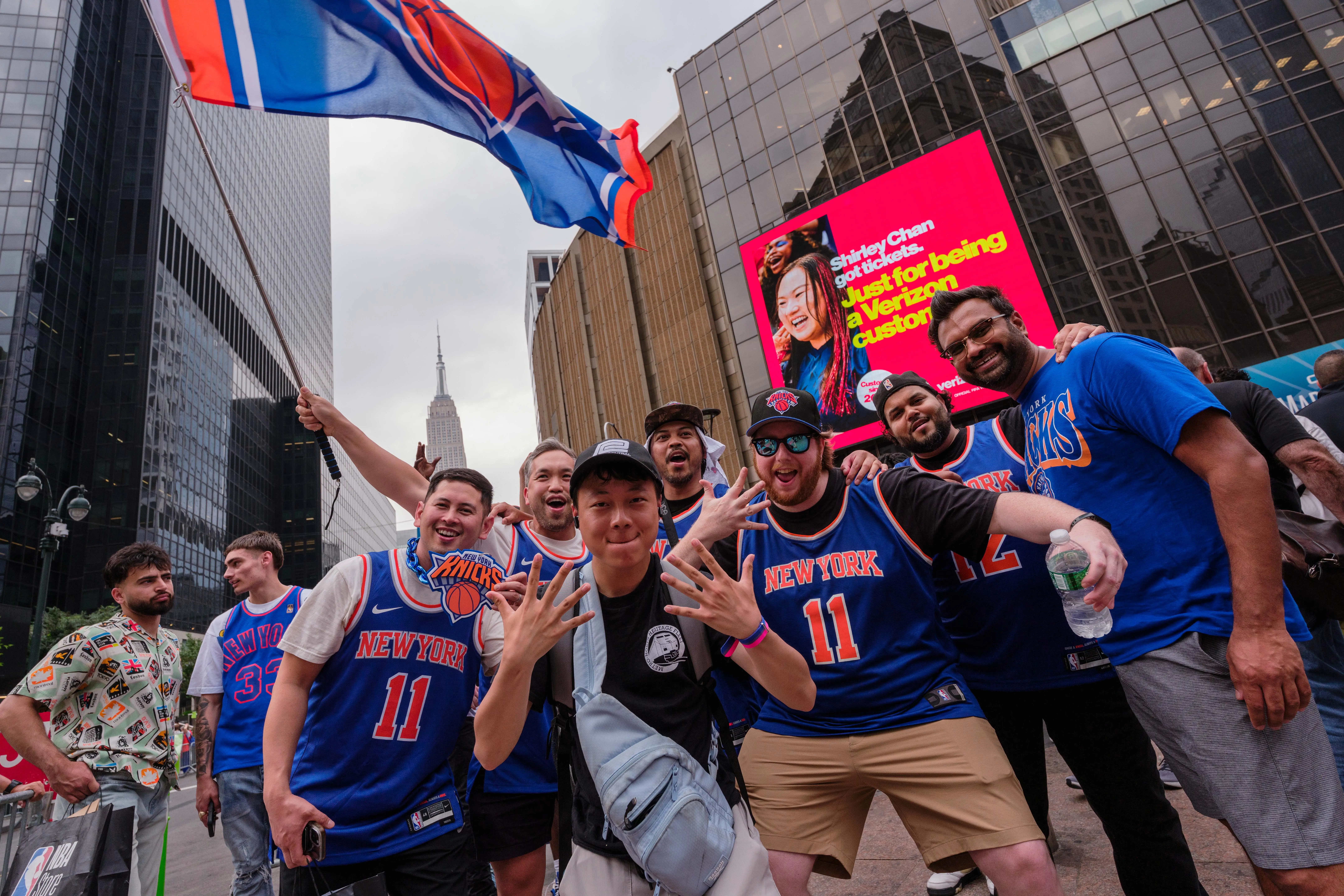 Knicks fans gather outside Madison Square Garden.