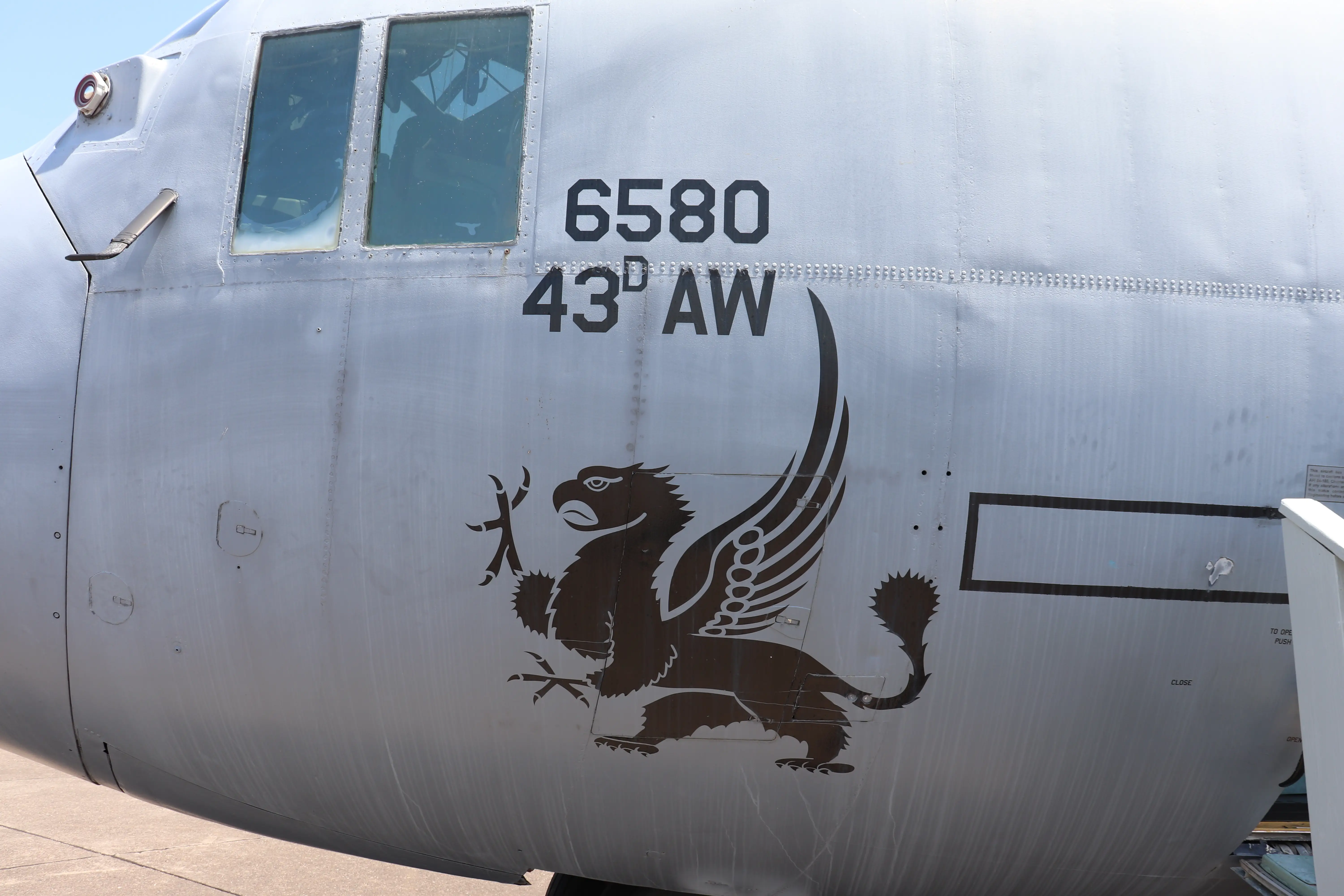 The Fighting Gryphon of the 43rd Airlift Wing on a C-130E Hercules.