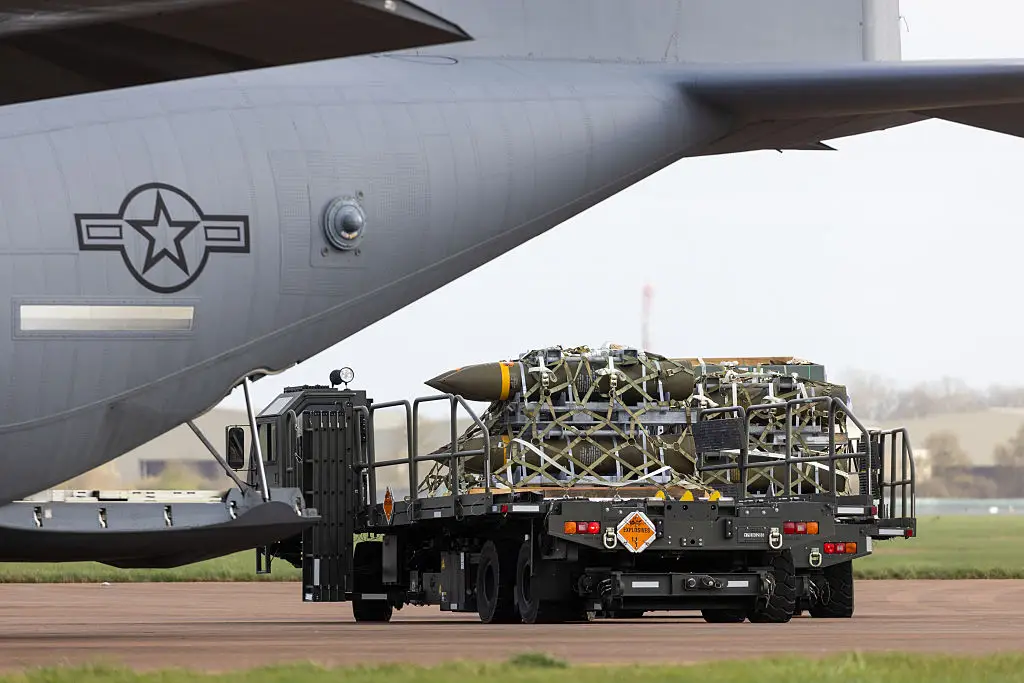 Bombs unloaded from a C-130.