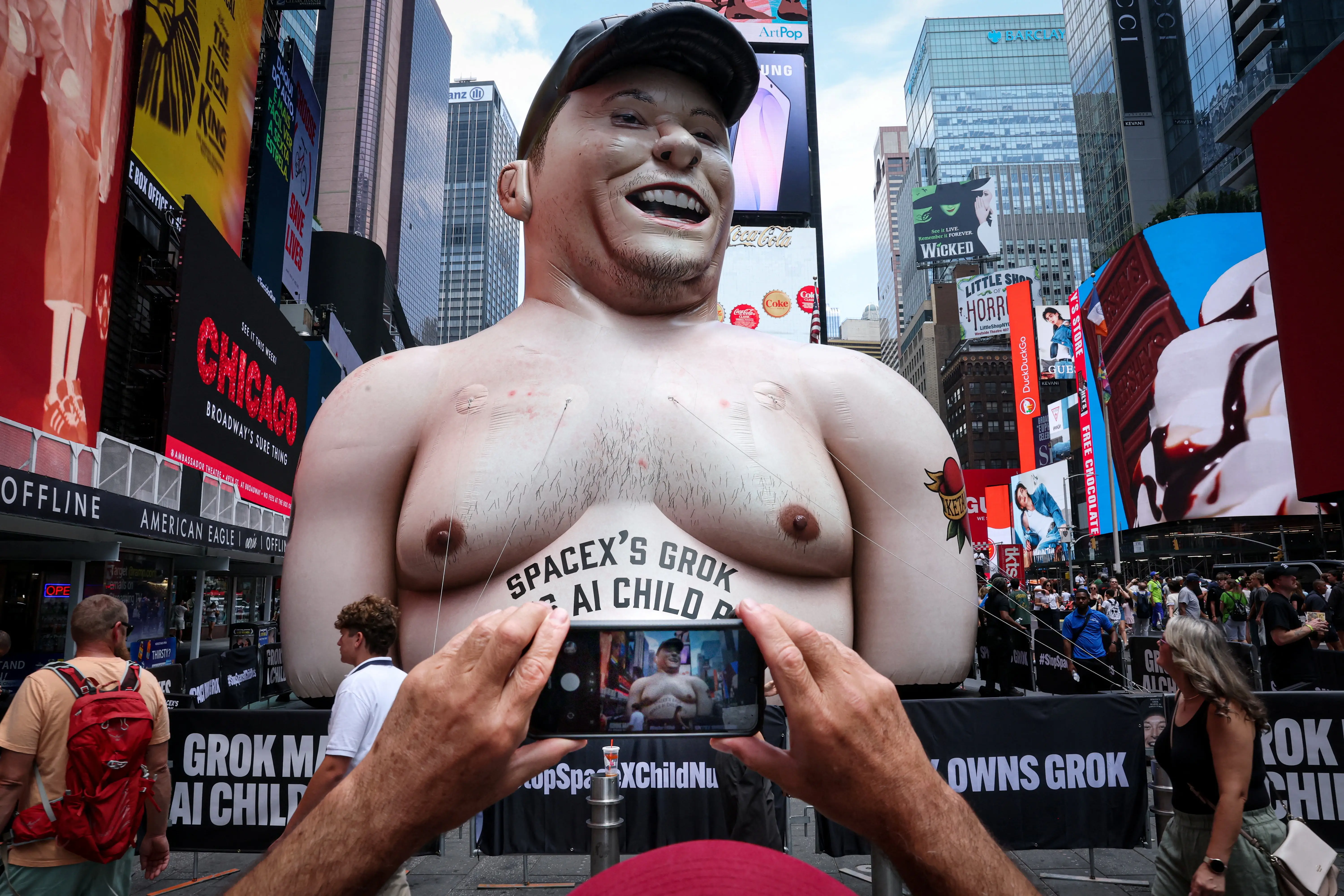 A giant inflatable Elon Musk pops up in Times Square