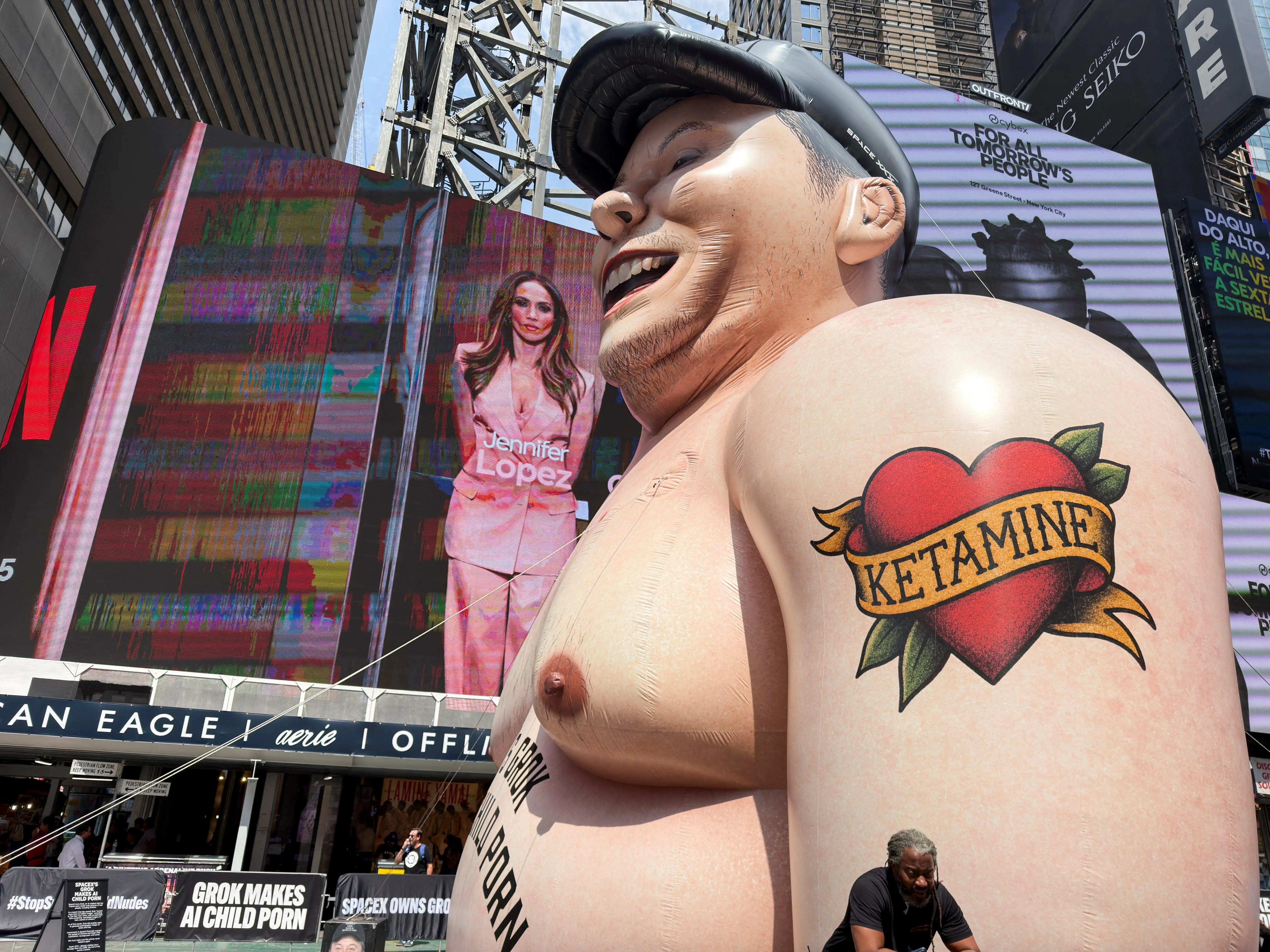 An inflatable Elon Musk in Times Square