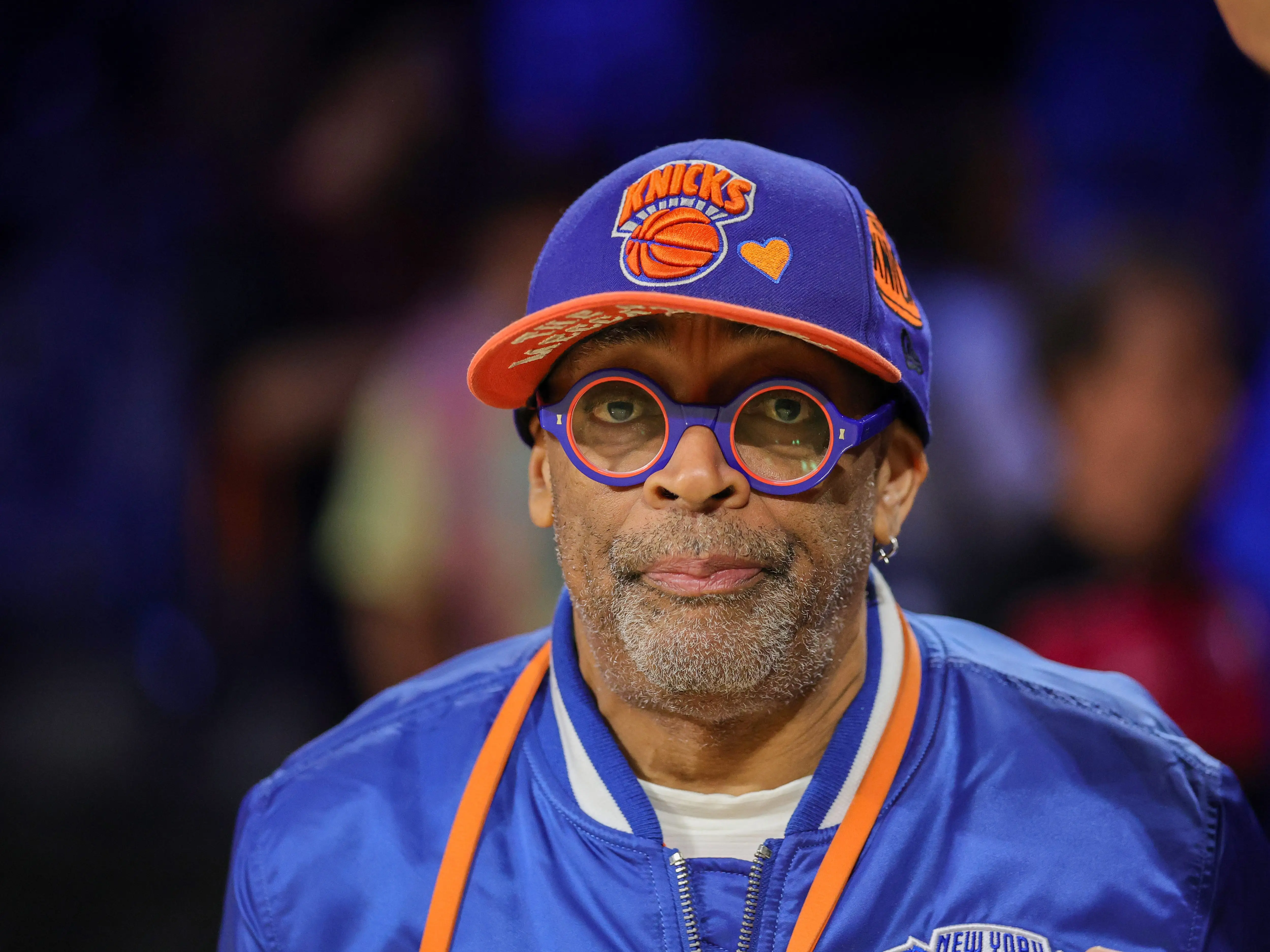 Spike Lee at an NBA game supporting the New York Knicks.