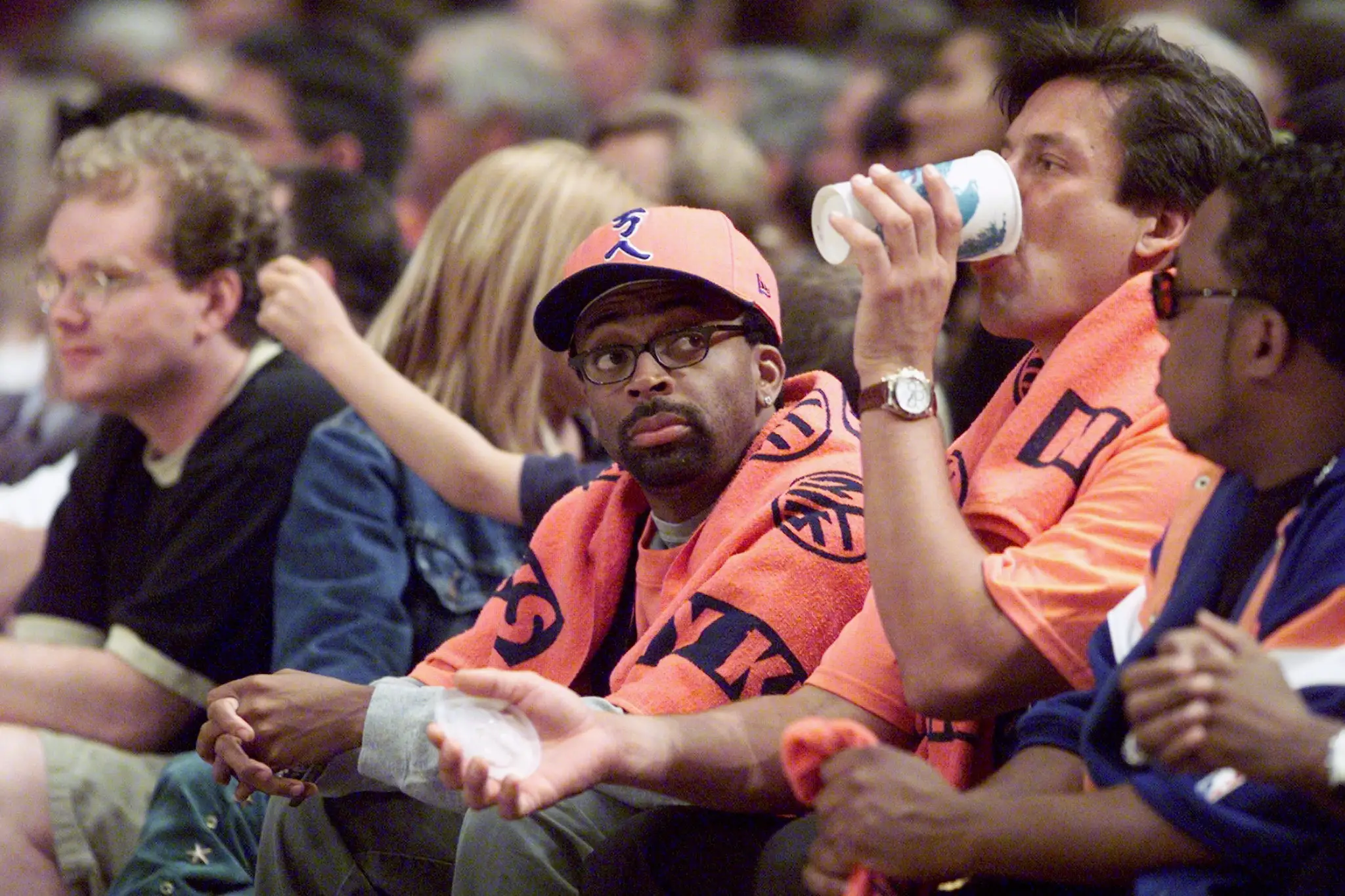 New York Knicks' fan Spike Lee watches from the sidelines during Game 4 of the NBA Finals against the San Antonio Spurs at Madison Square Garden in 1999.