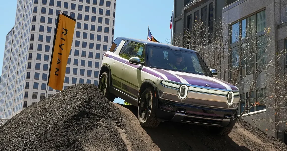 RJ Scaringe said there are 2 big reasons Rivian’s new R2 doesn’t look like a Tesla Model Y dupe