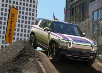 RJ Scaringe said there are 2 big reasons Rivian’s new R2 doesn’t look like a Tesla Model Y dupe