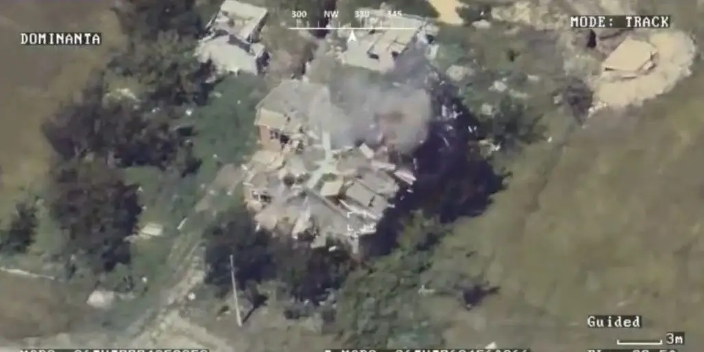 Drone footage shows the roof of the house exploding into splinters upon impact.
