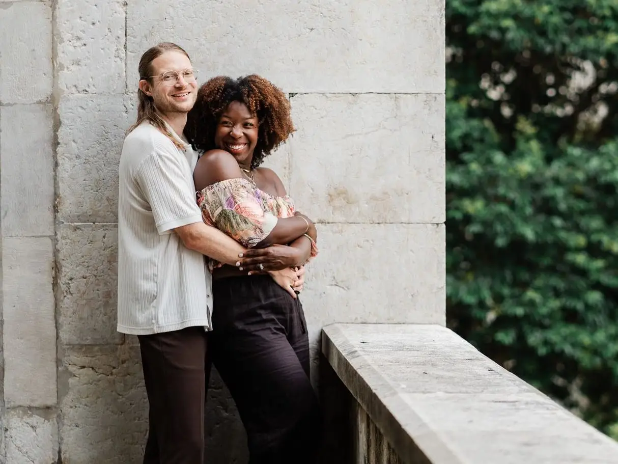 Ashley Strahm and her husband embracing