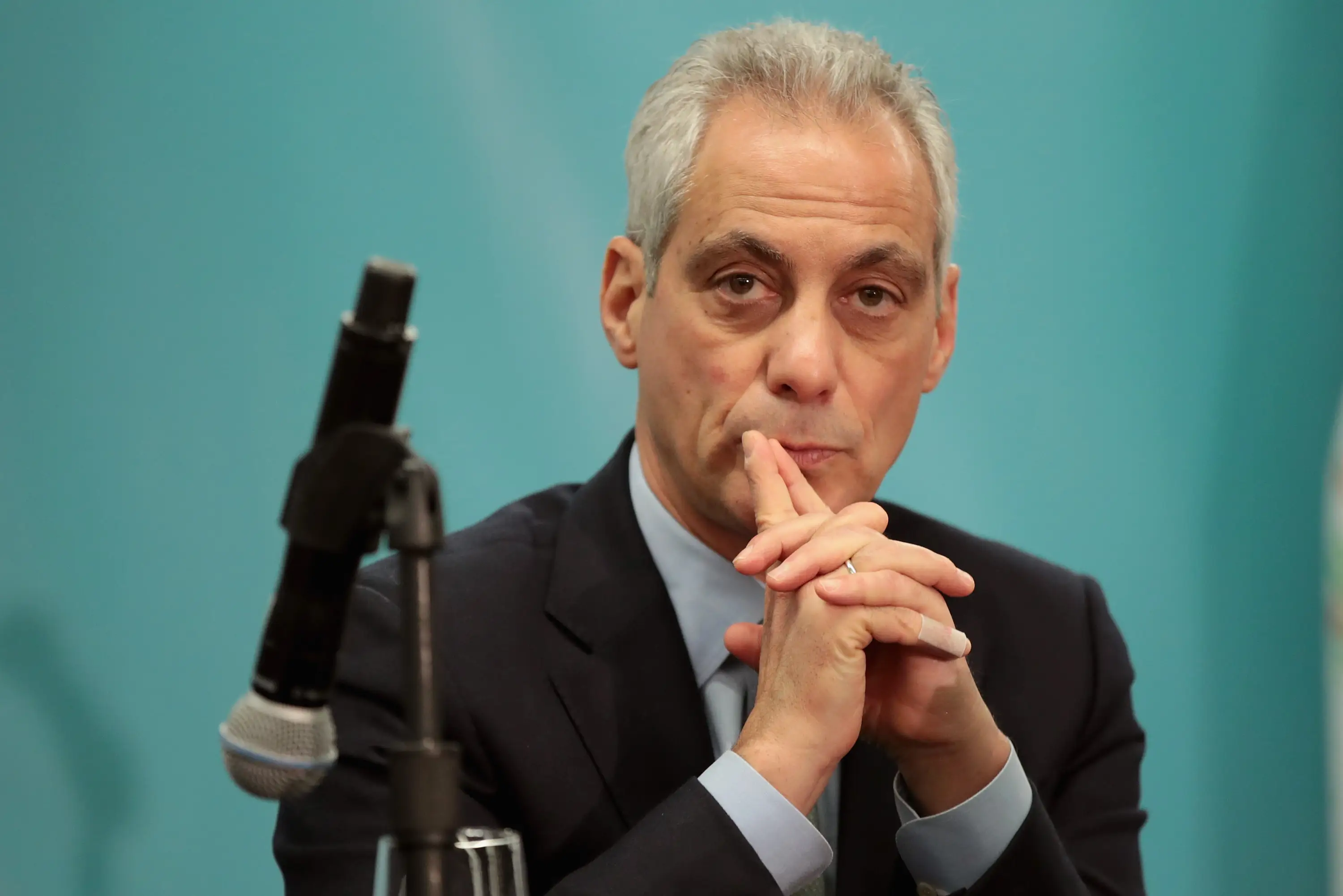 Rahm Emanuel at a microphone