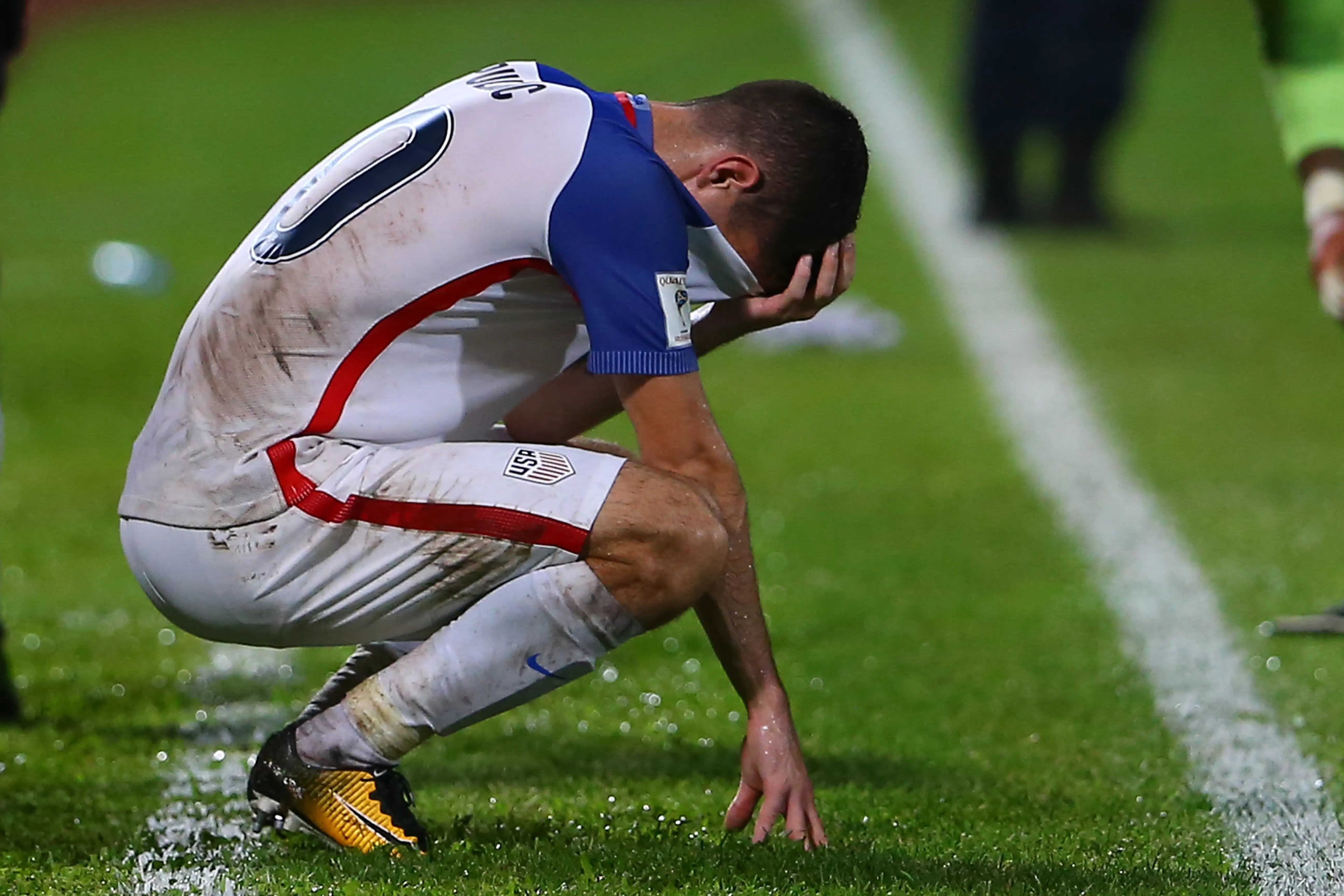 Christian Pulisic of the United States reacts to their loss to Trinidad and Tobago during the FIFA World Cup Qualifier match in 2017.