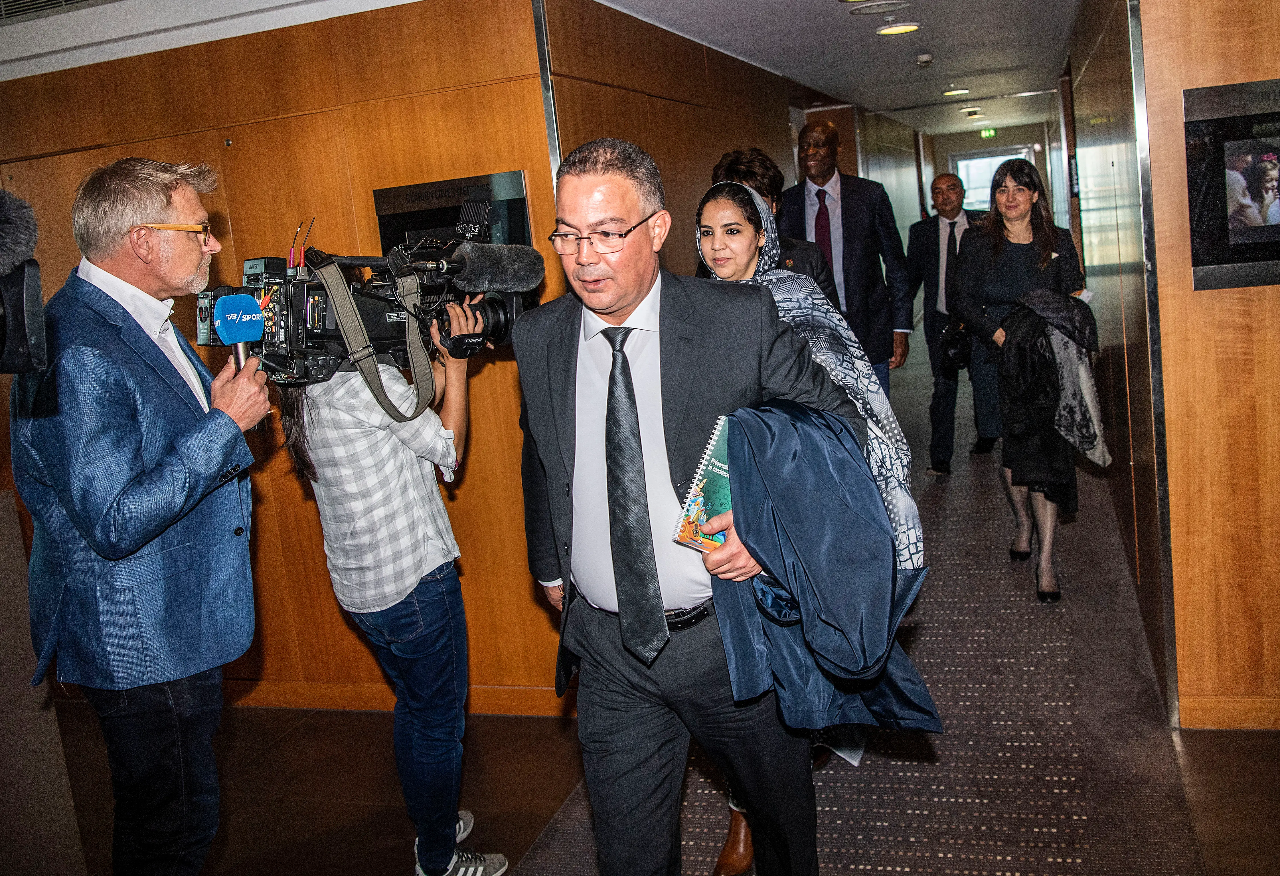 Fouzi Lekjaa, president of Morocco's Royal Football Federation, leaves a meeting to present their bid to host the World Cup 2026.