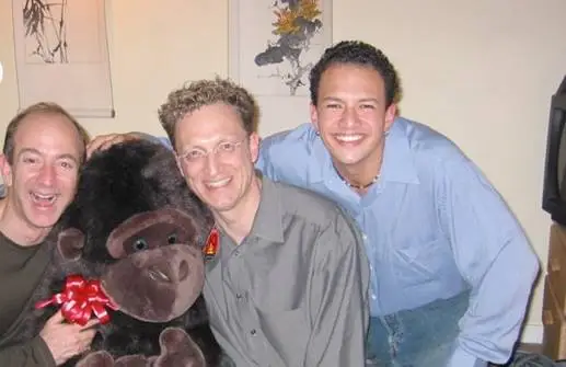 a photo of David Selinger, Jeff Bezos, and another Amazon employee in the early 2000s