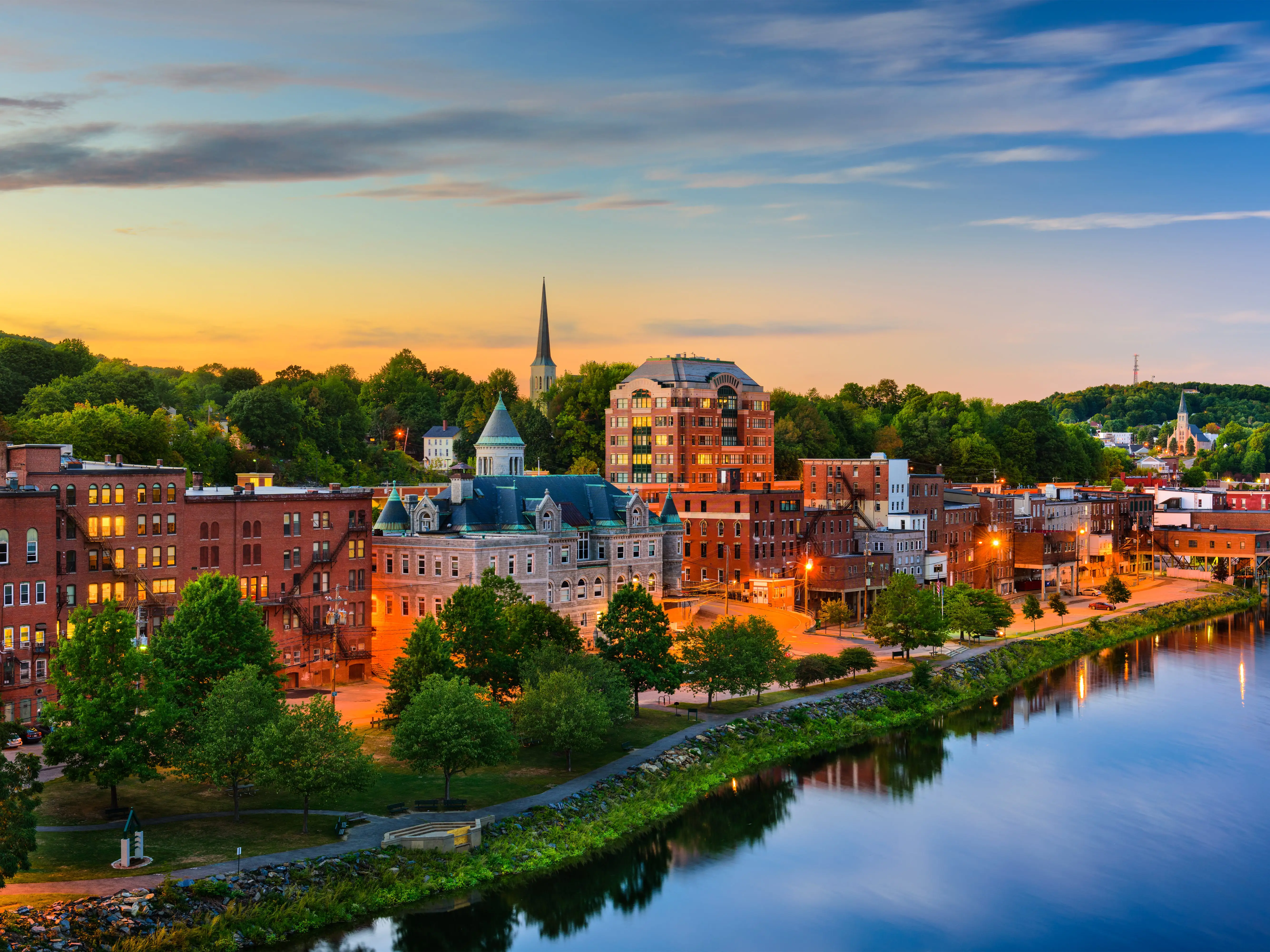 Augusta, Maine, USA downtown skyline on the Kennebec River.