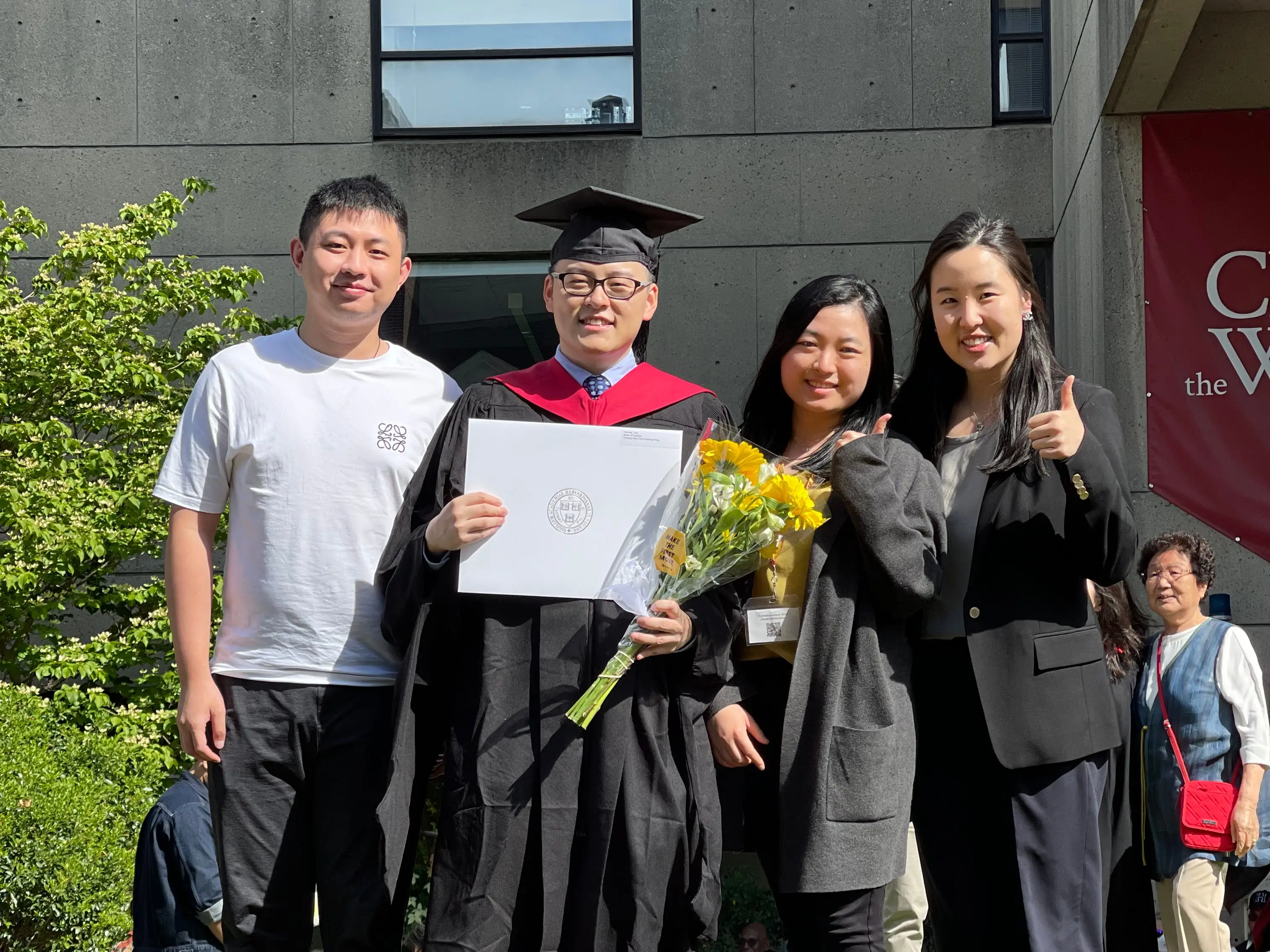 Charlie Fang graduating from Harvard.