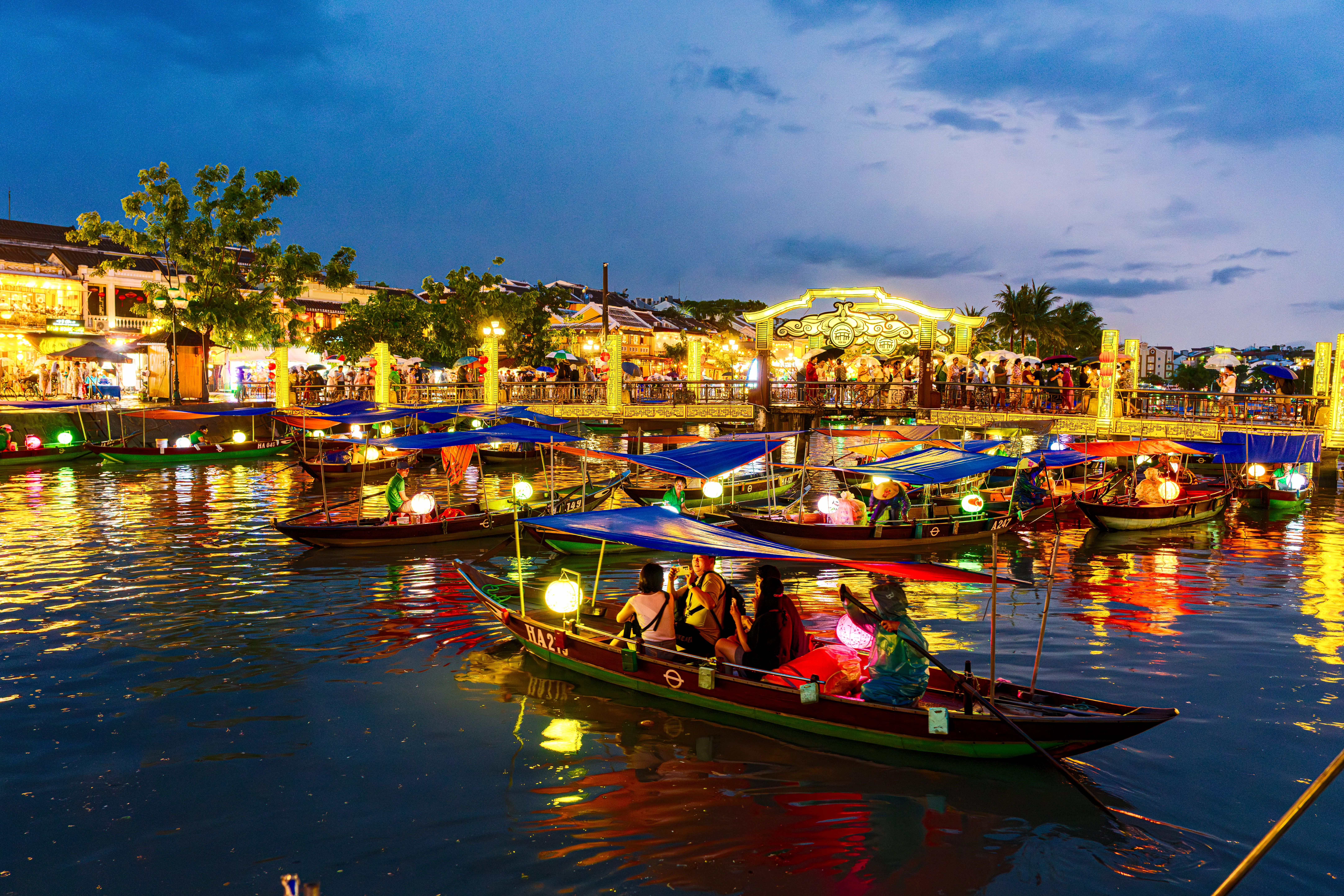 Boats with colorful lanterns at night in Hoi An