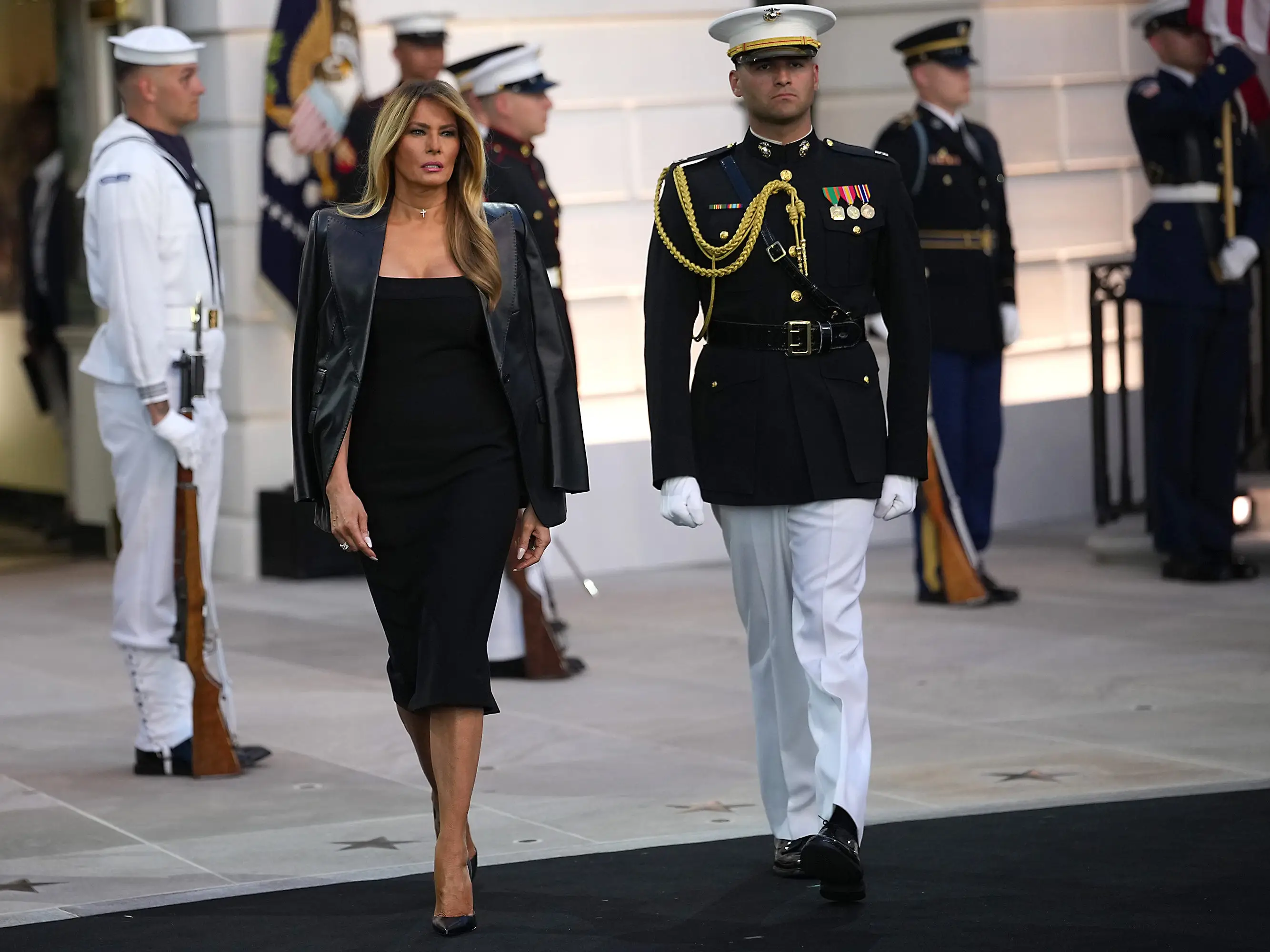 Melania Trump walks out of the White House onto the South Lawn for the UFC Freedom 250 fight in June 2026.