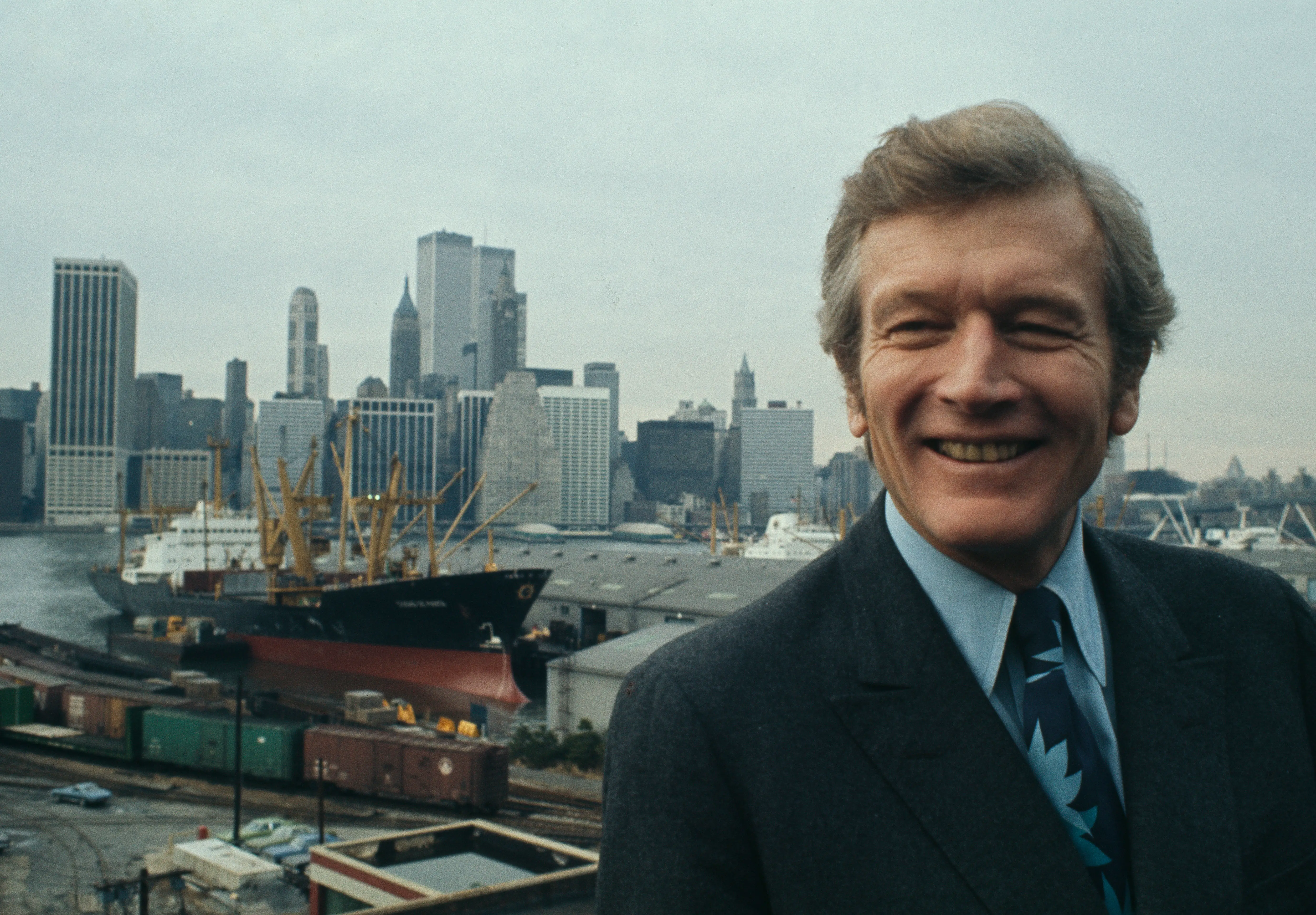 Mayor of New York John Lindsay (1921 - 2000) is pictured with the skyline of lower Manhattan behind him, two days before the end of his second term in office, December 29th 1973.