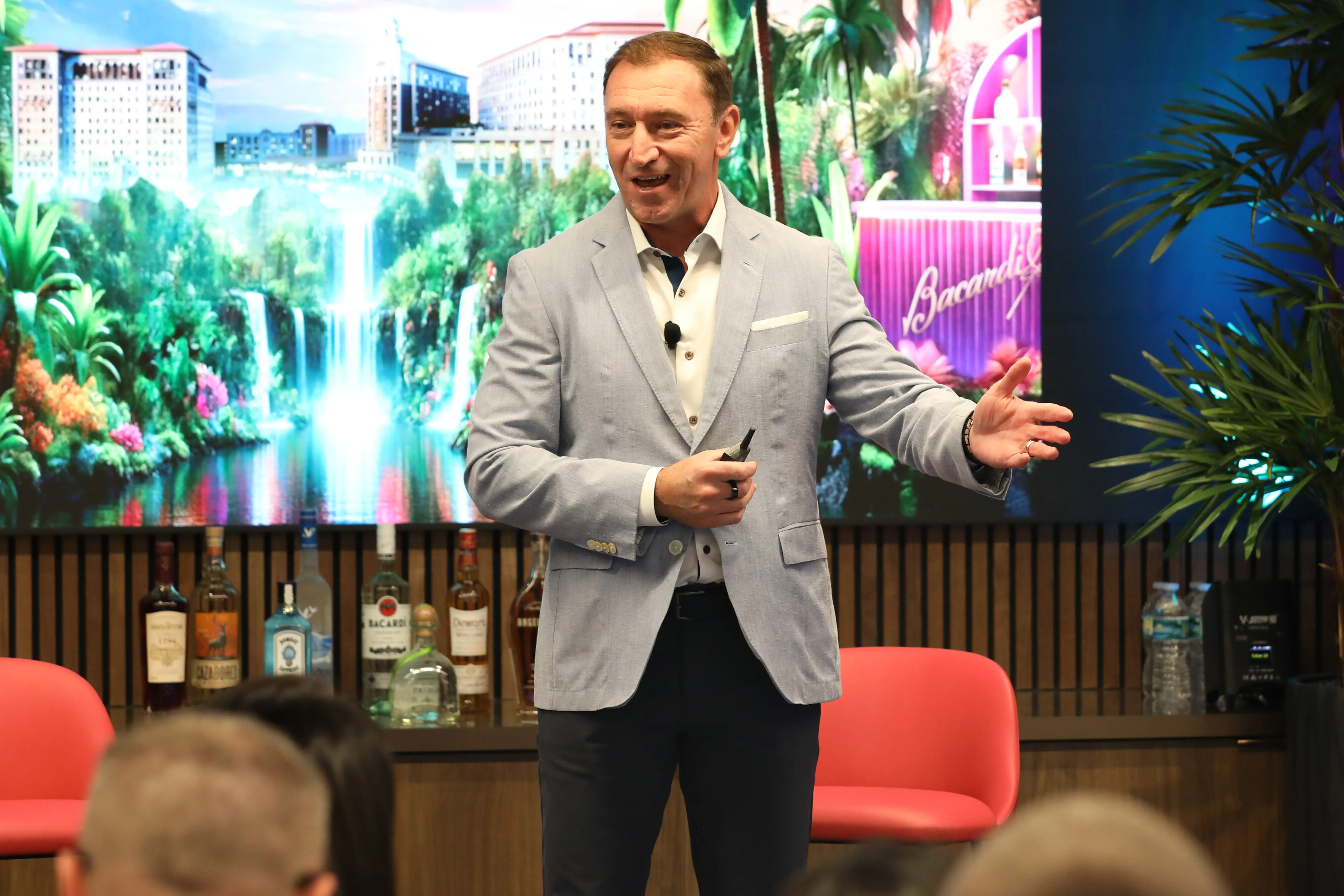 the president of Bacardi North America smiles for a crowd