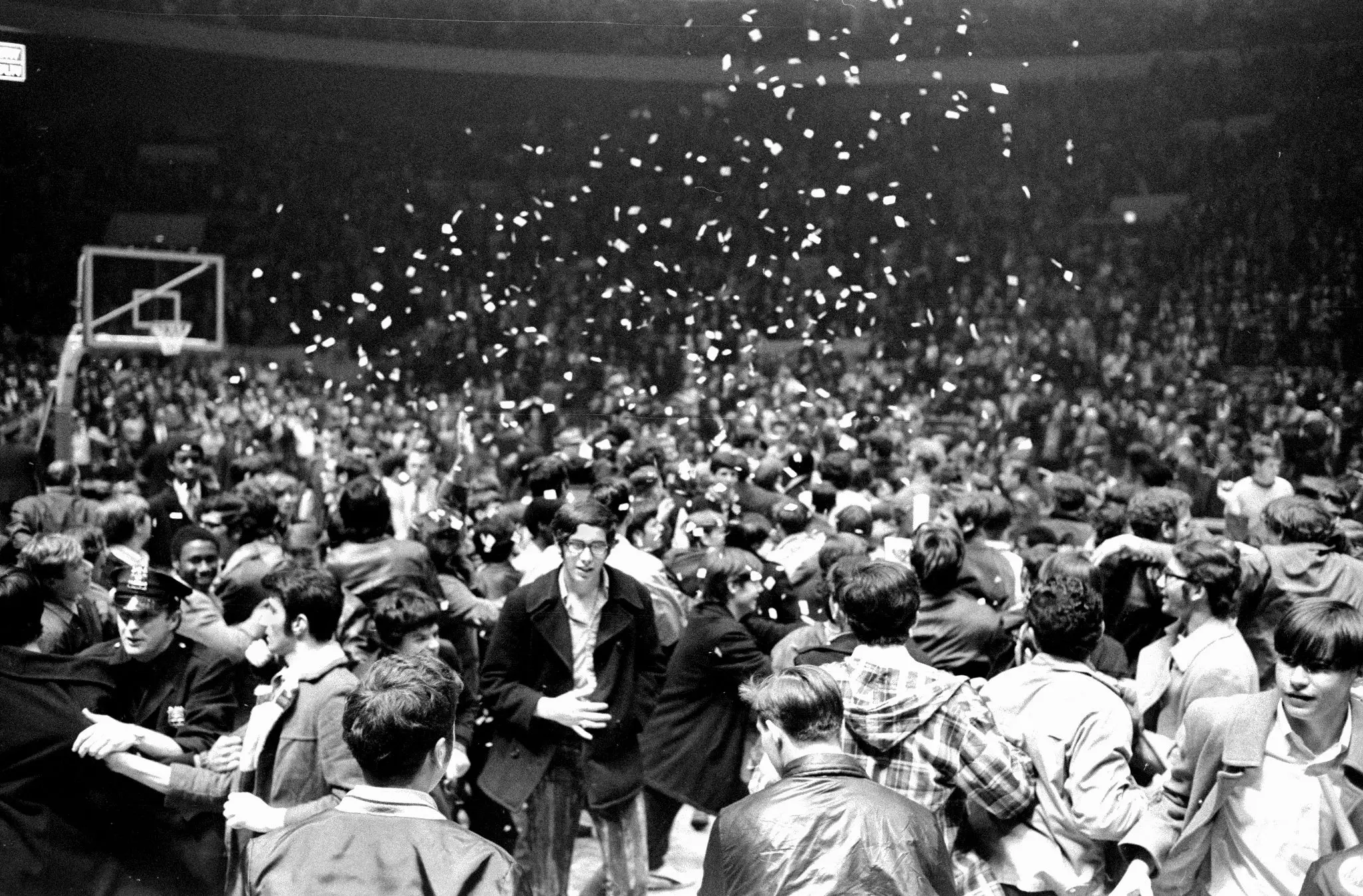 Fans celebrate the New York Knicks' win over the Milwaukee Bucks, 4-1, in the Eastern NBA Playoffs at the Garden.