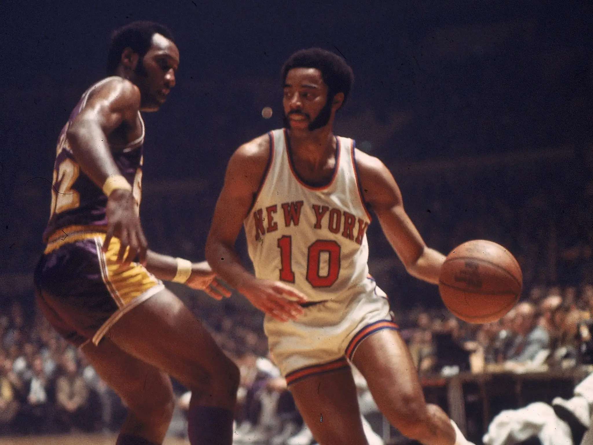 New York Knicks guard Walt Frazier (10) handles the ball during game against the Los Angeles Lakers at Madison Square Garden, New York City, Feb. 17, 1973.