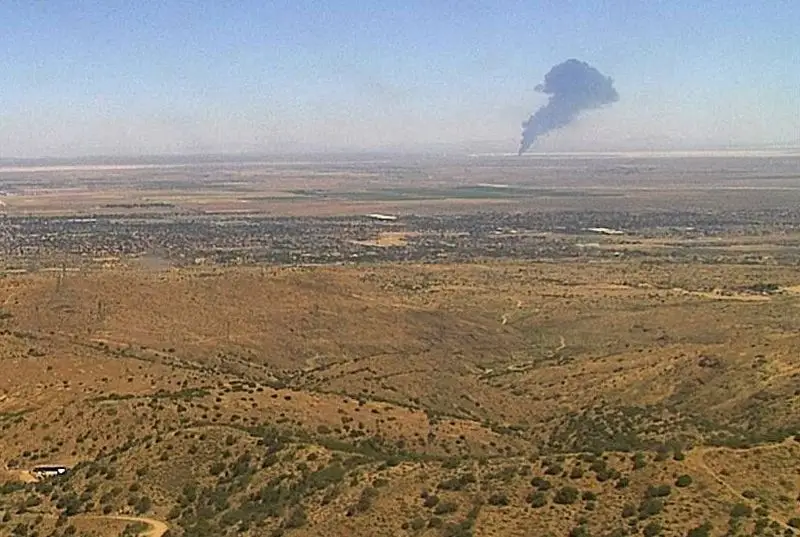 Smoke rises from Edwards Air Force Base after the crash of a U.S. Air Force B-52 bomber aircraft in Edwards, California, U.S., June 15, 2026, in a still image from an ALERTCalifornia fire surveillance camera.
