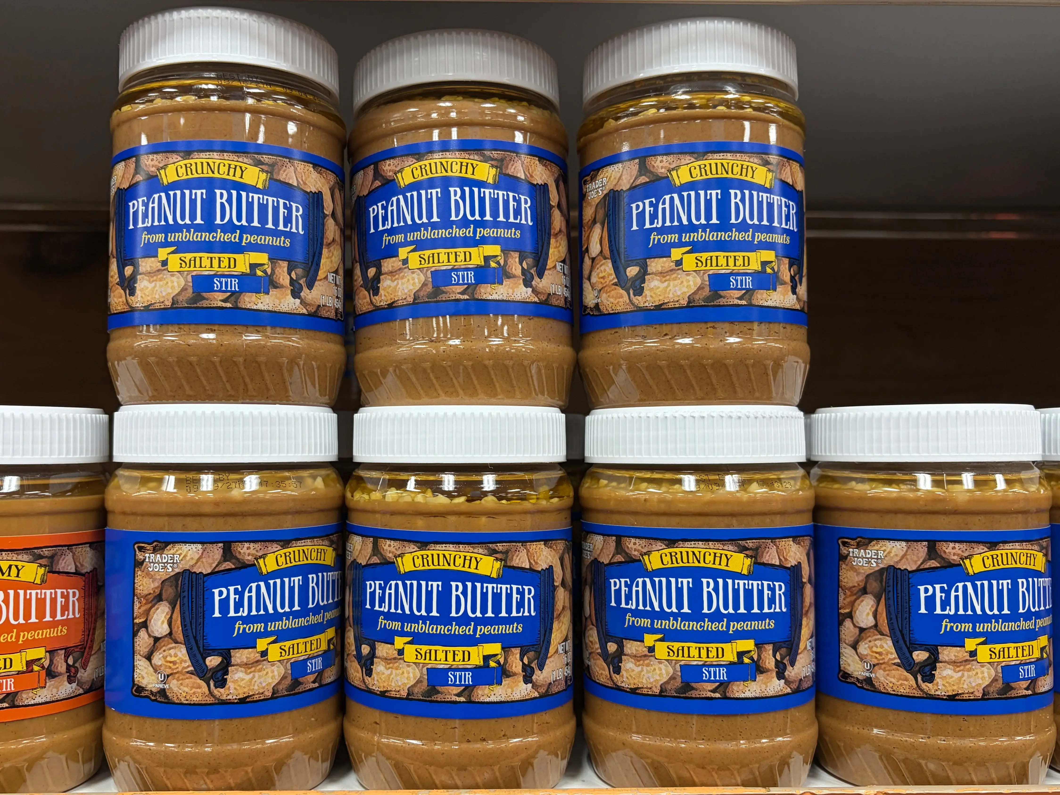 Jars of Trader Joe's crunchy peanut butter.