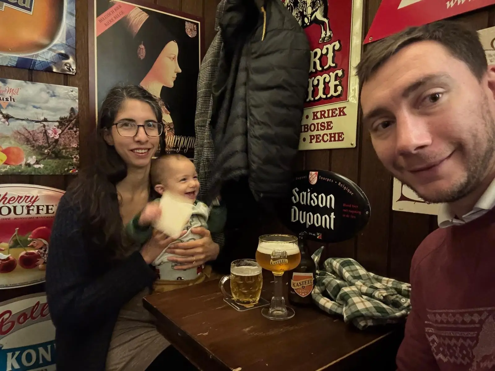 The author with her husband and their son while at a pub.