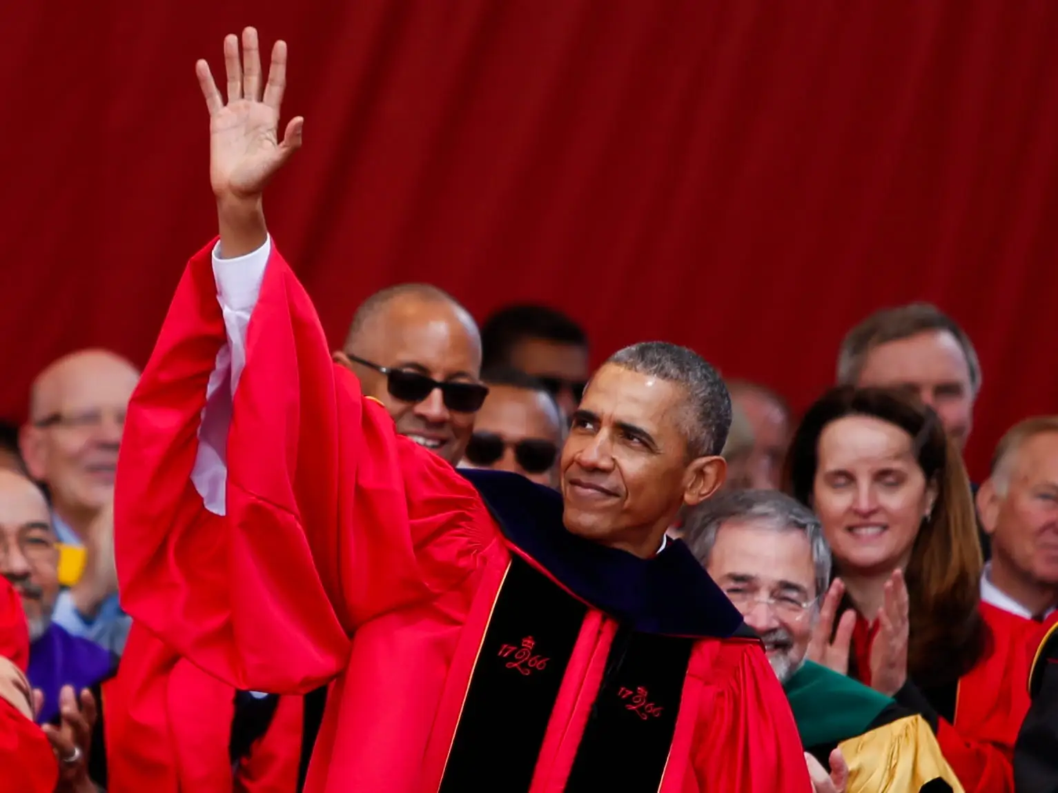 NEW BRUNSWICK, NJ - MAY 15: U.S. President Barack Obama waves to the crowd as he leaves the stage at the conclusion of his speech during the 250th anniversary commencement ceremony at Rutgers University on May 15, 2016 in New Brunswick, New Jersey. Obama is the first sitting president to speak at the school's commencement.