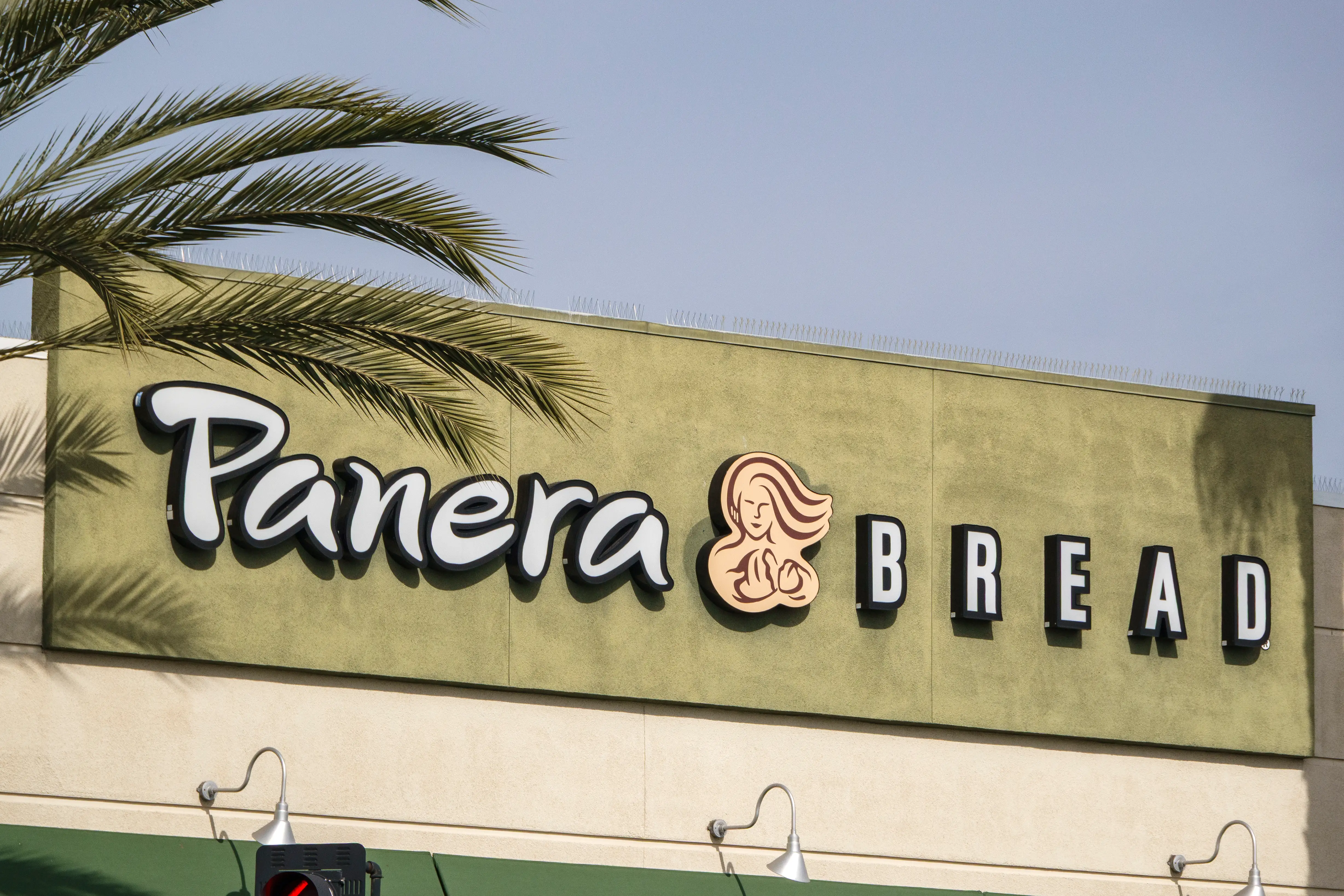 The exterior signage of a Panera Bread location