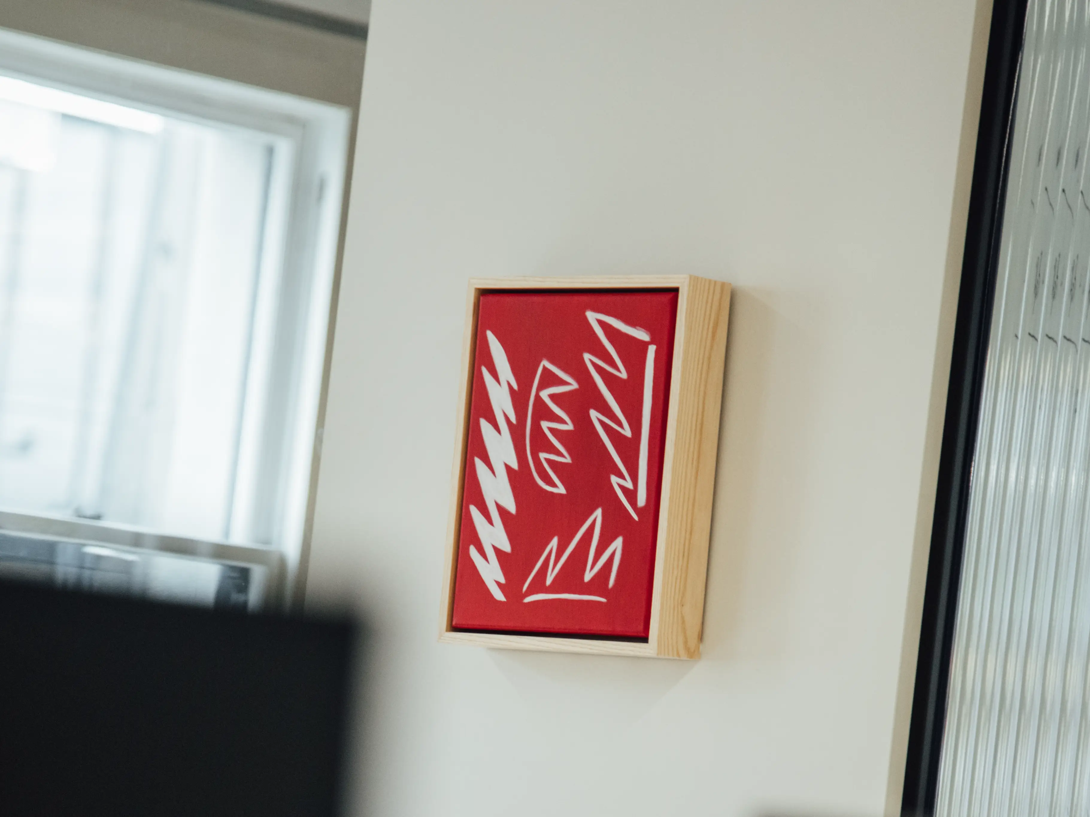 Art in Previously Unavailable's office space.