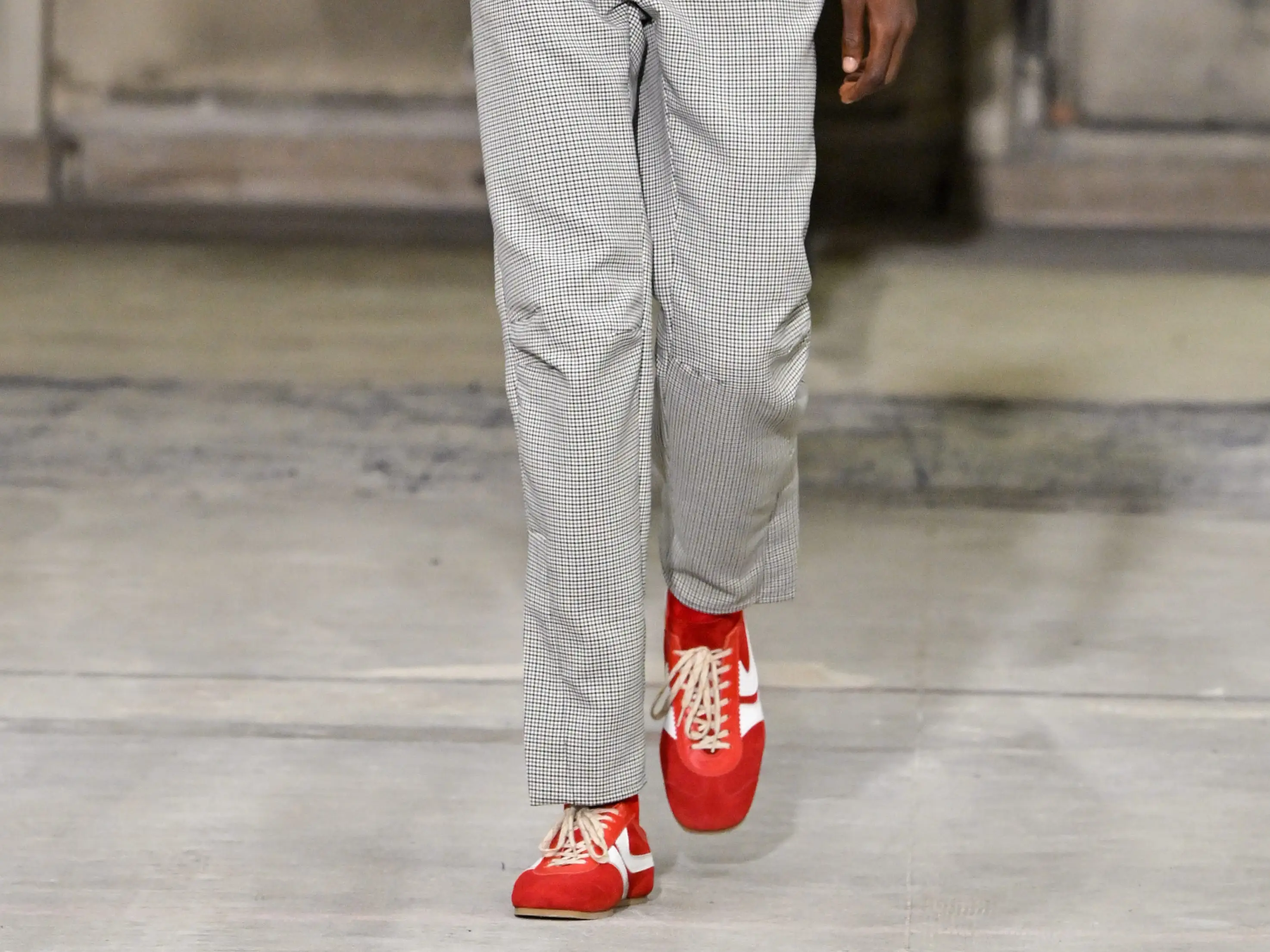 A model walks the Dries Van Noten runway during Paris Men's Fashion Week 2025.