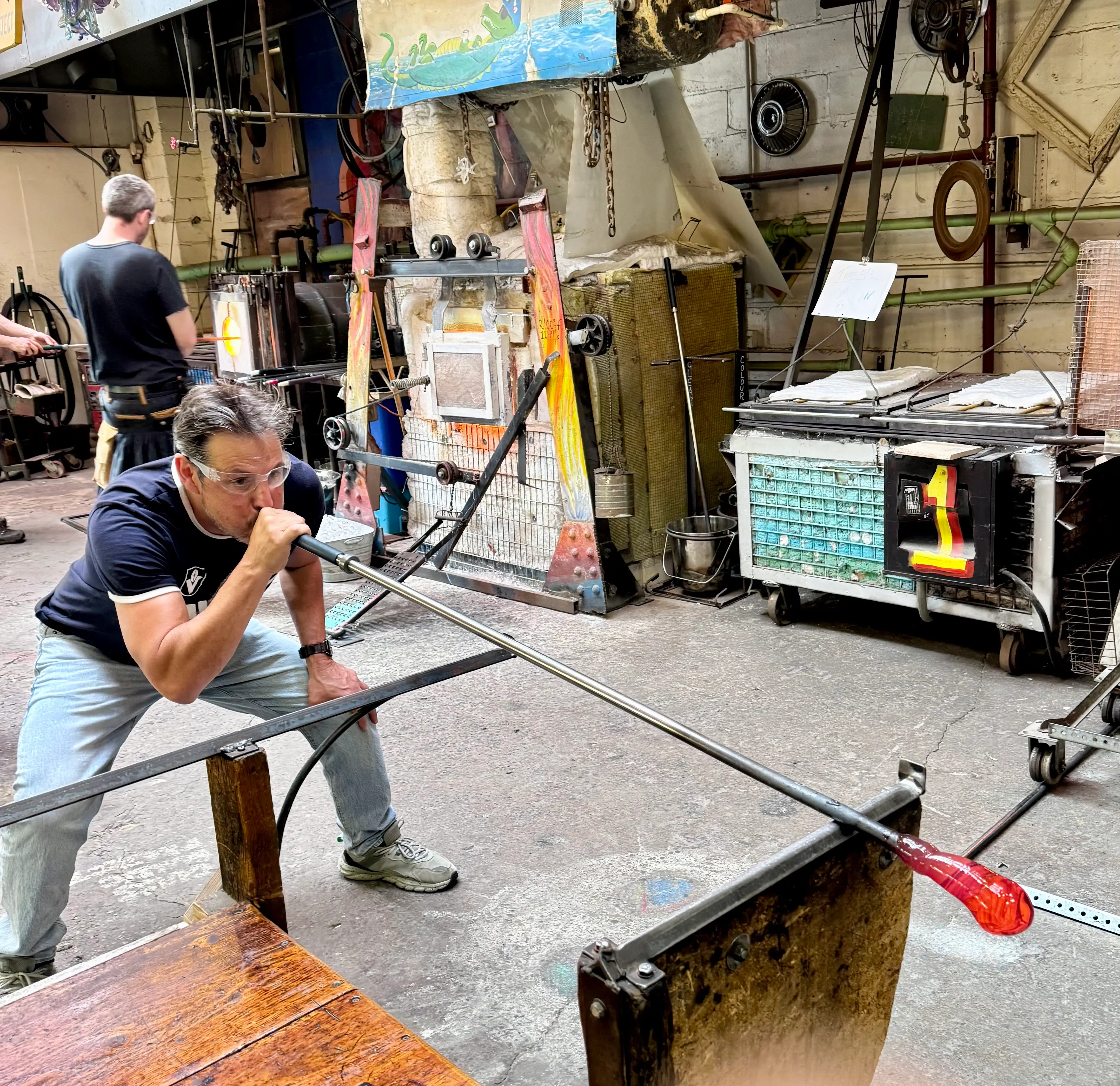 Author Ash Jurberg glass blowing