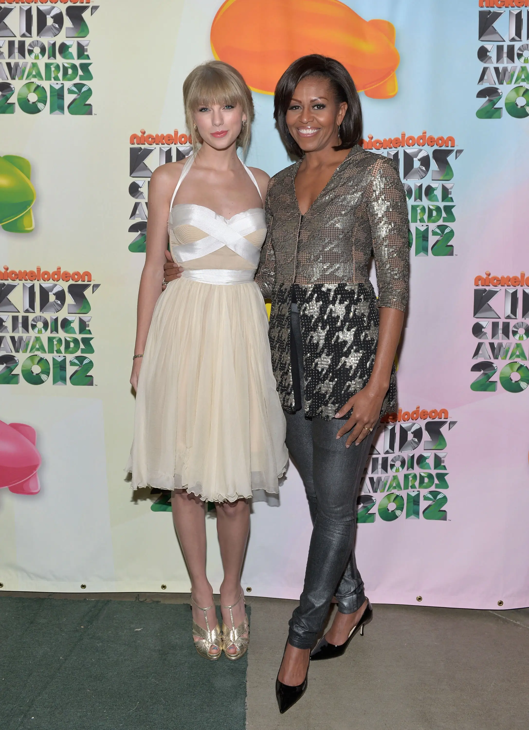 Taylor Swift and Michelle Obama attend the Kids' Choice Awards in March 2012.