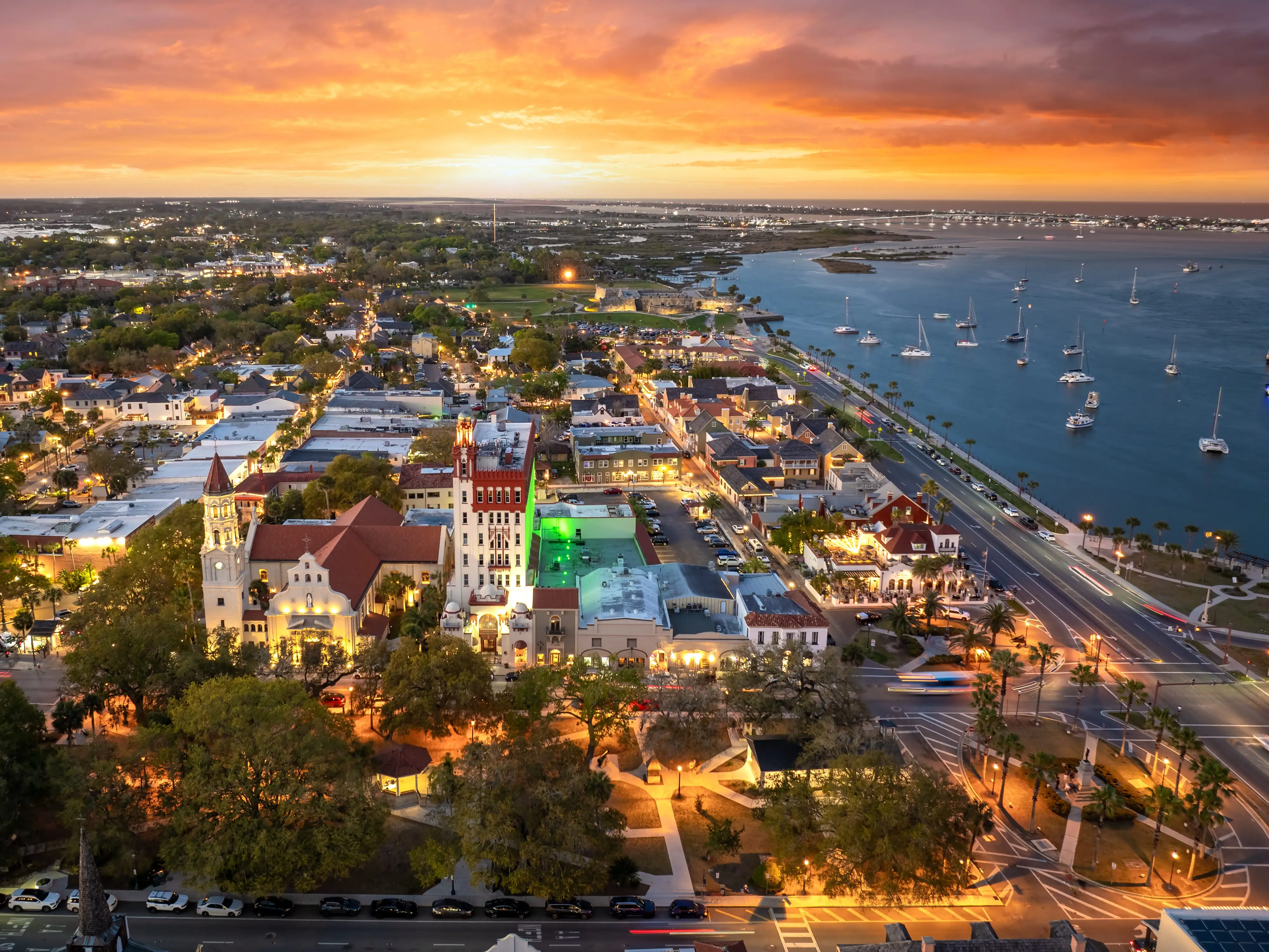 Historical American city architecture. St. Augustine, old city in Florida state at night. Streets and buildings from above.