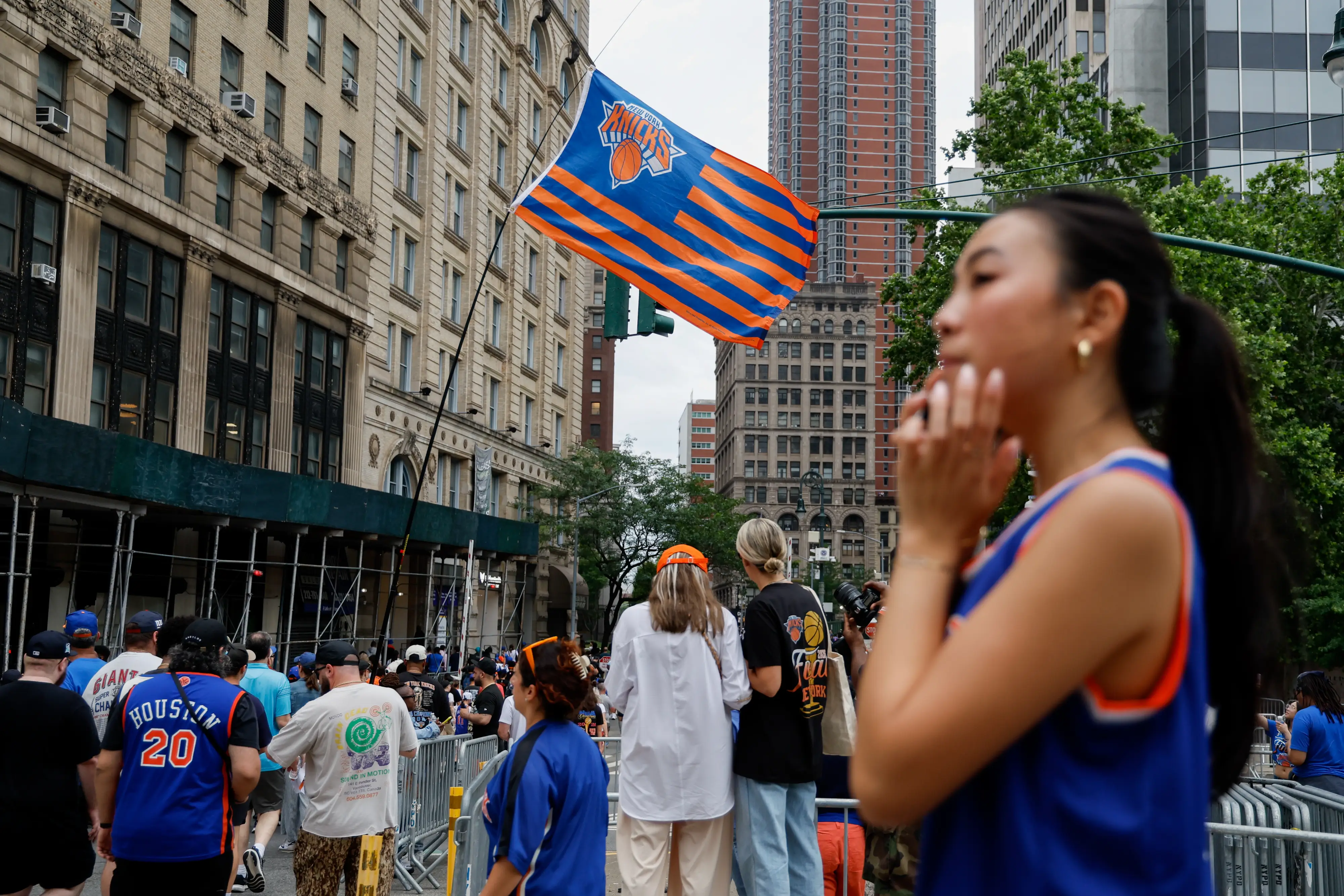 Fans arrive ahead of a ticker-tape parade to celebrate the New York Knicks' NBA Championship win, in New York, US, on Thursday, June 18, 2026.