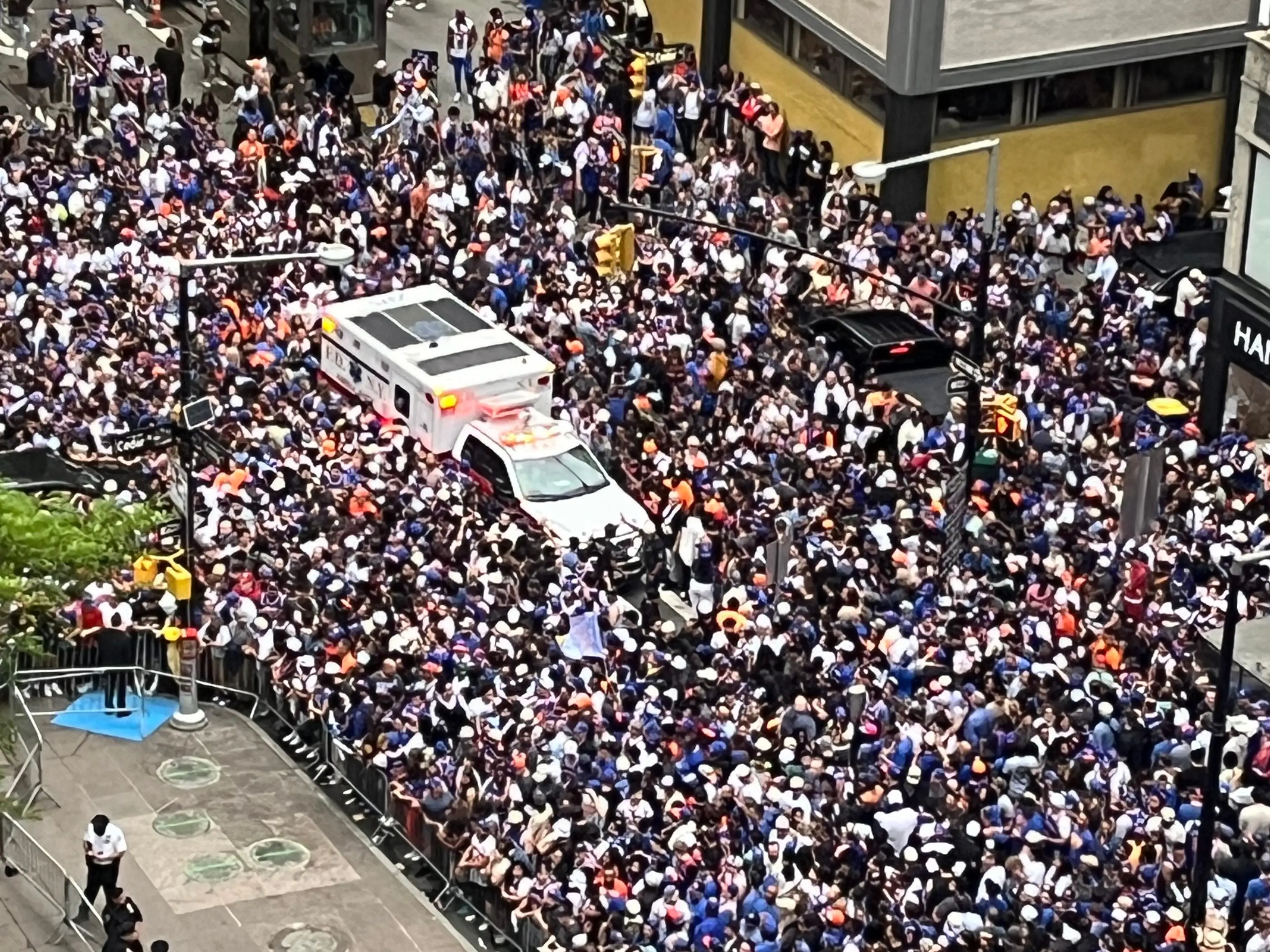AMbulance stuck in the crowd in Knicks parade in NYC