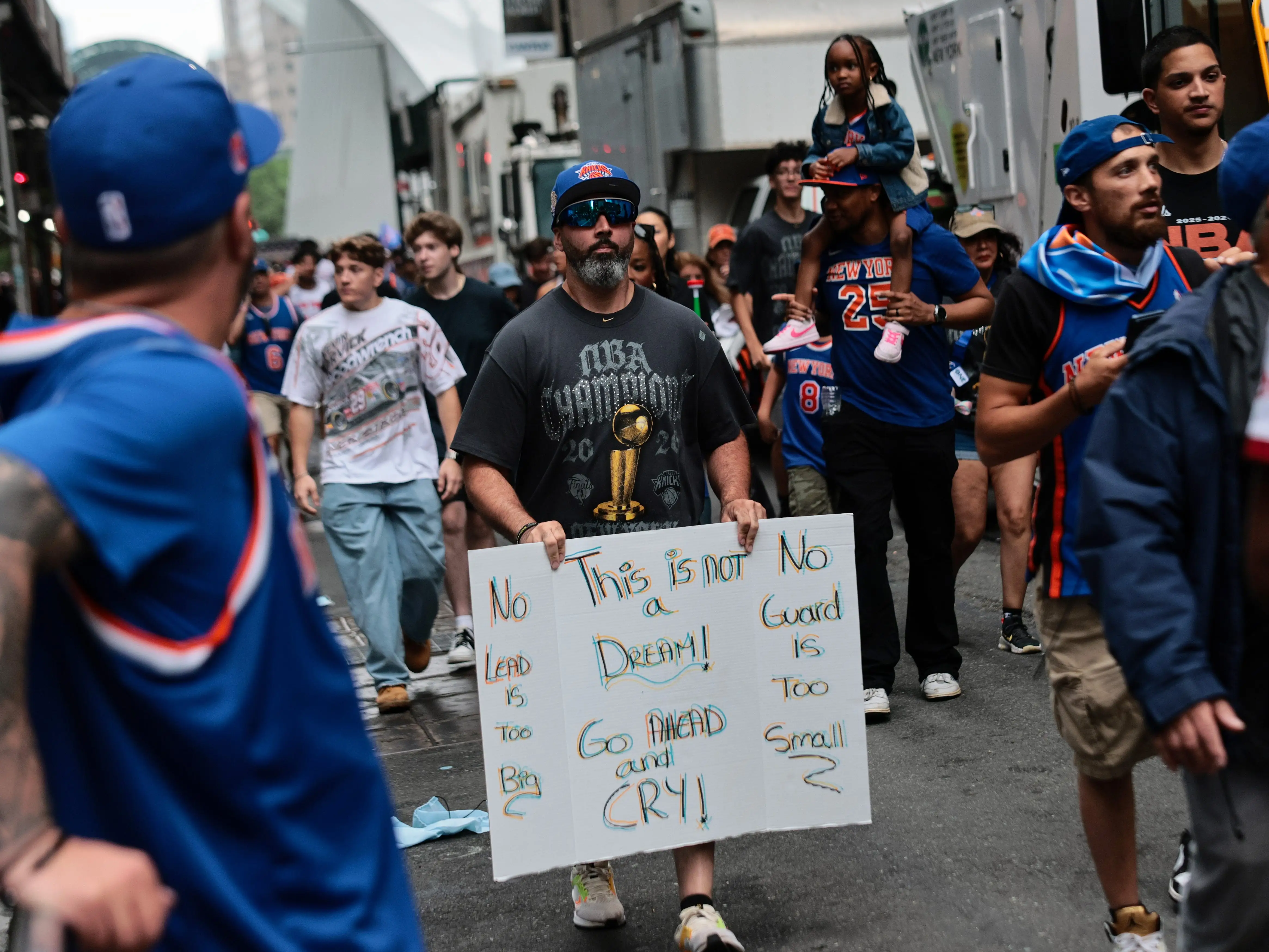 Fans arrive ahead of the New York Knicks Championship ticker tape parade and victory rally celebrating winning the 2026 NBA Finals on June 18, 2026