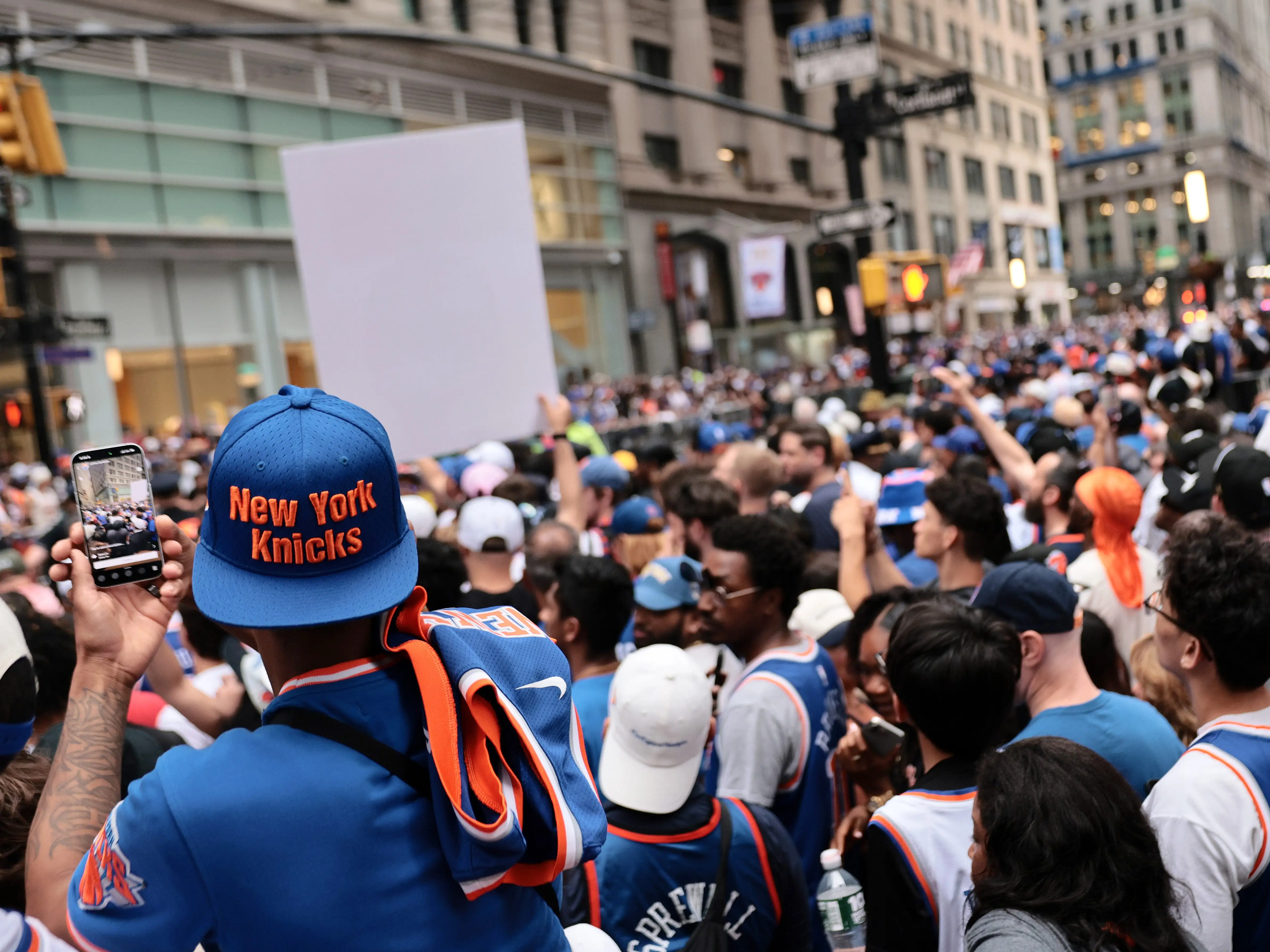 Fans line up ahead of the New York Knicks Championship ticker tape parade and victory rally celebrating winning the 2026 NBA Finals on June 18, 2026 in New York City.