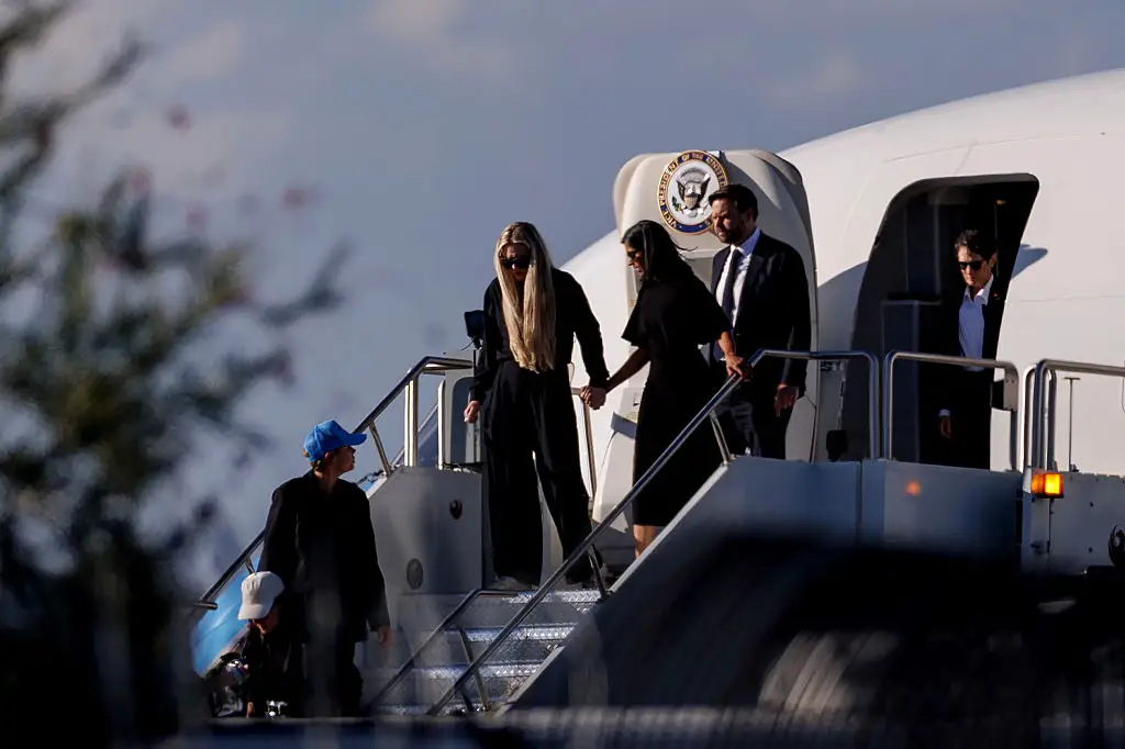 JD Vance and Usha Vance with Erika Kirk, escorting the body of Charlie Kirk on Air Force Two